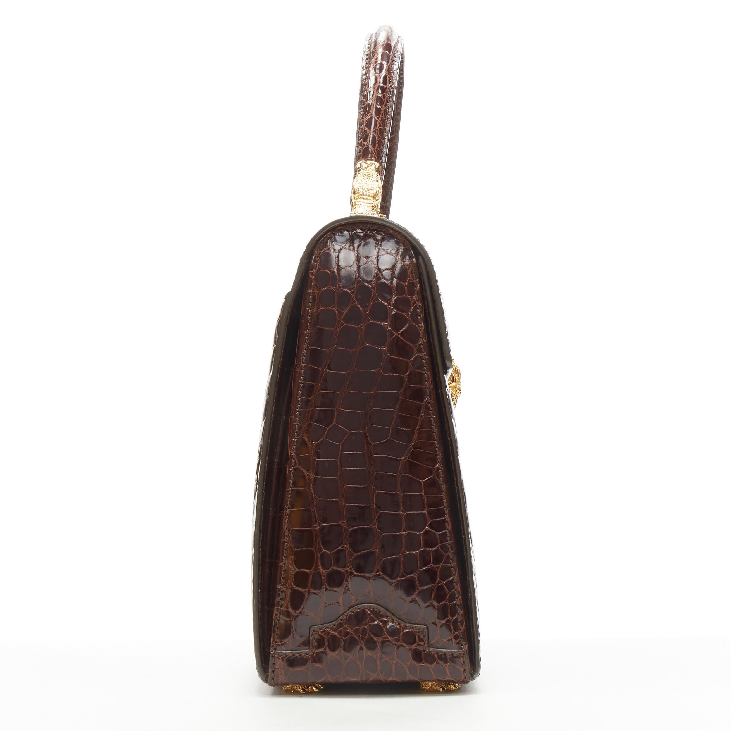KWANPEN - Sac à bandoulière en cuir poli marron avec boucle crochetée dorée Pour femmes en vente