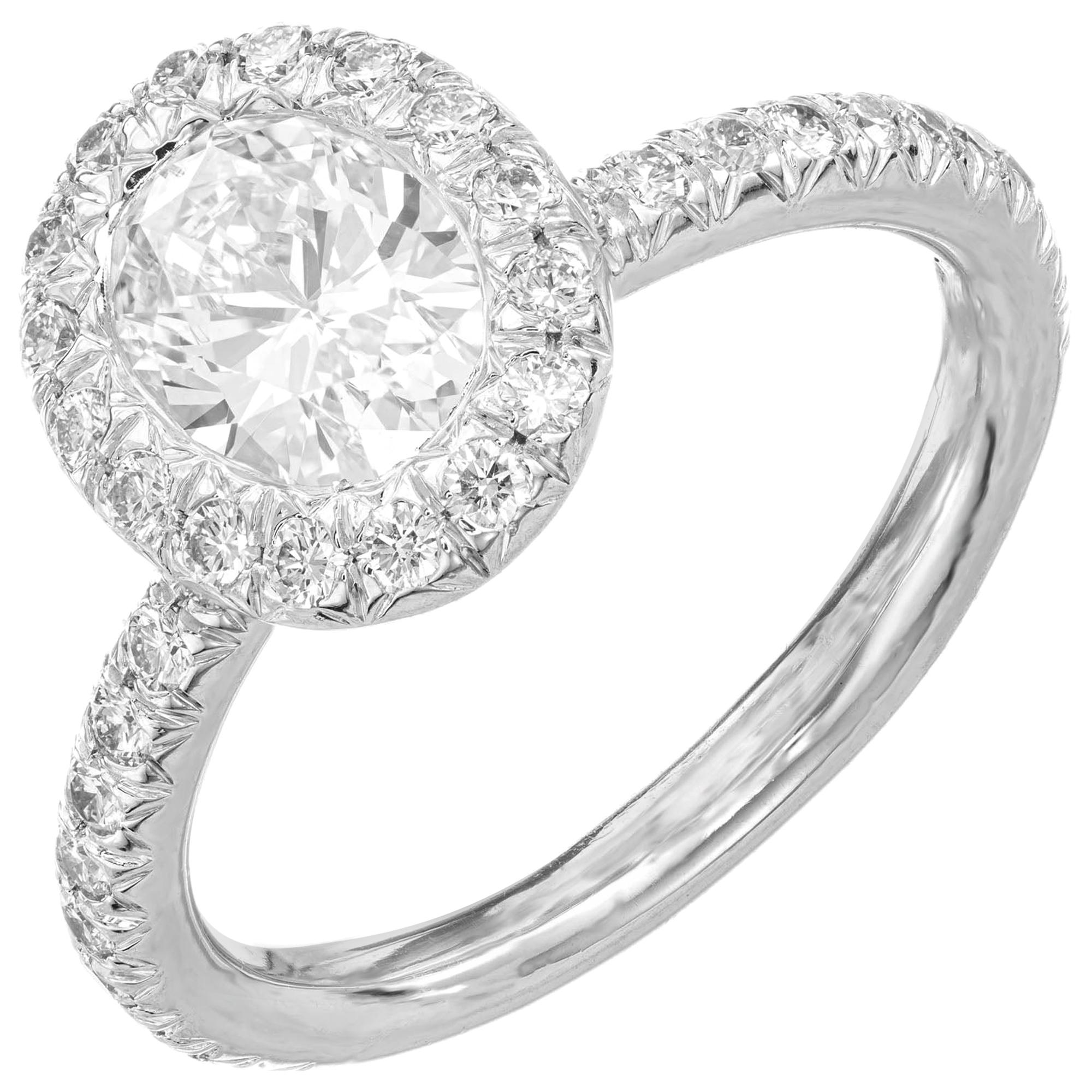Kwiat 1.10 Carat Oval Diamond Micro Pave Halo Platinum Engagement Ring For Sale