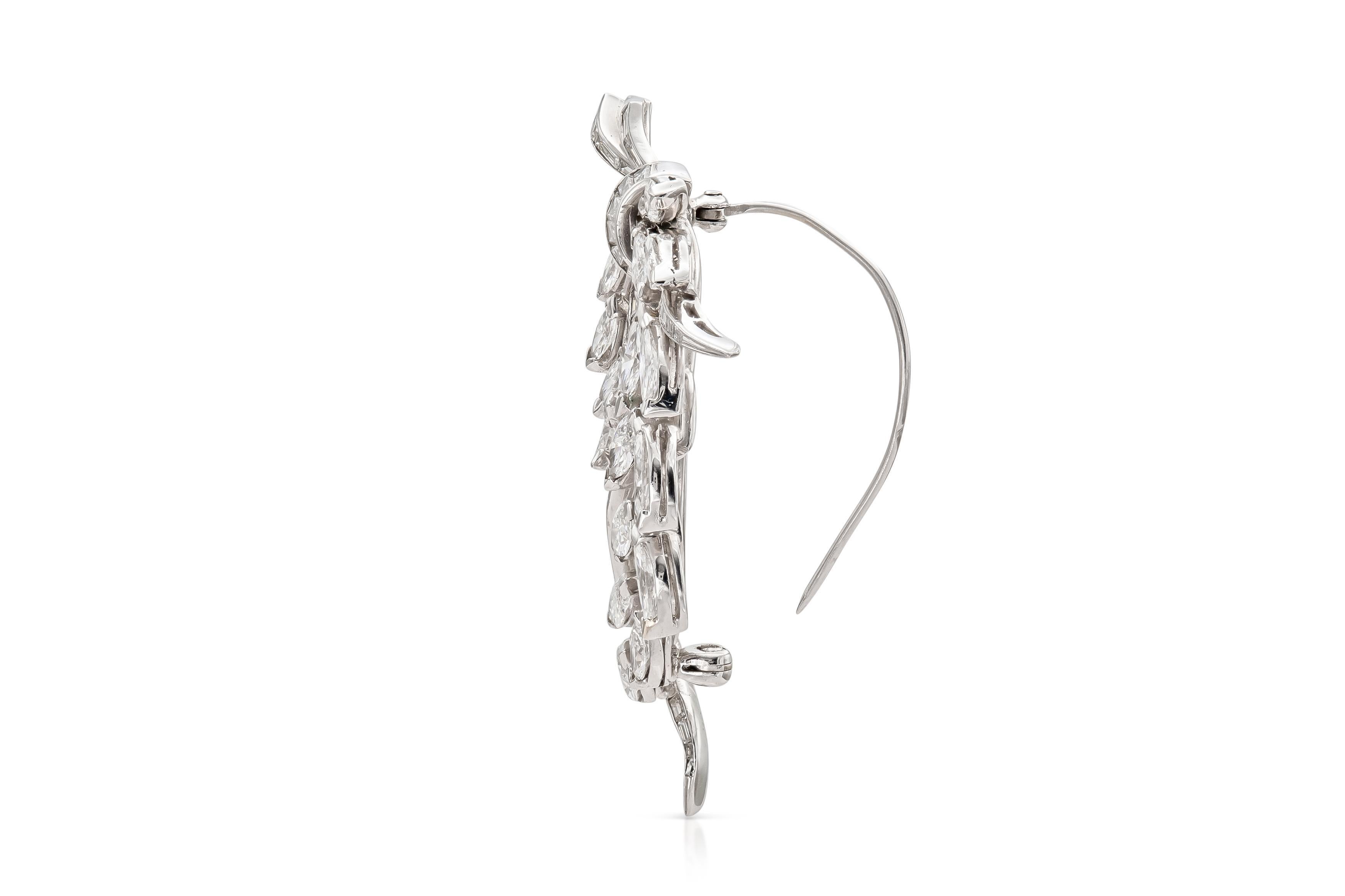 Finely crafted in platinum with Marquise and Baguette cut Diamonds weighing approximately a total of 7.00 carats.
Signed by Kwiat
2 1/4 x 1 1/2 inches