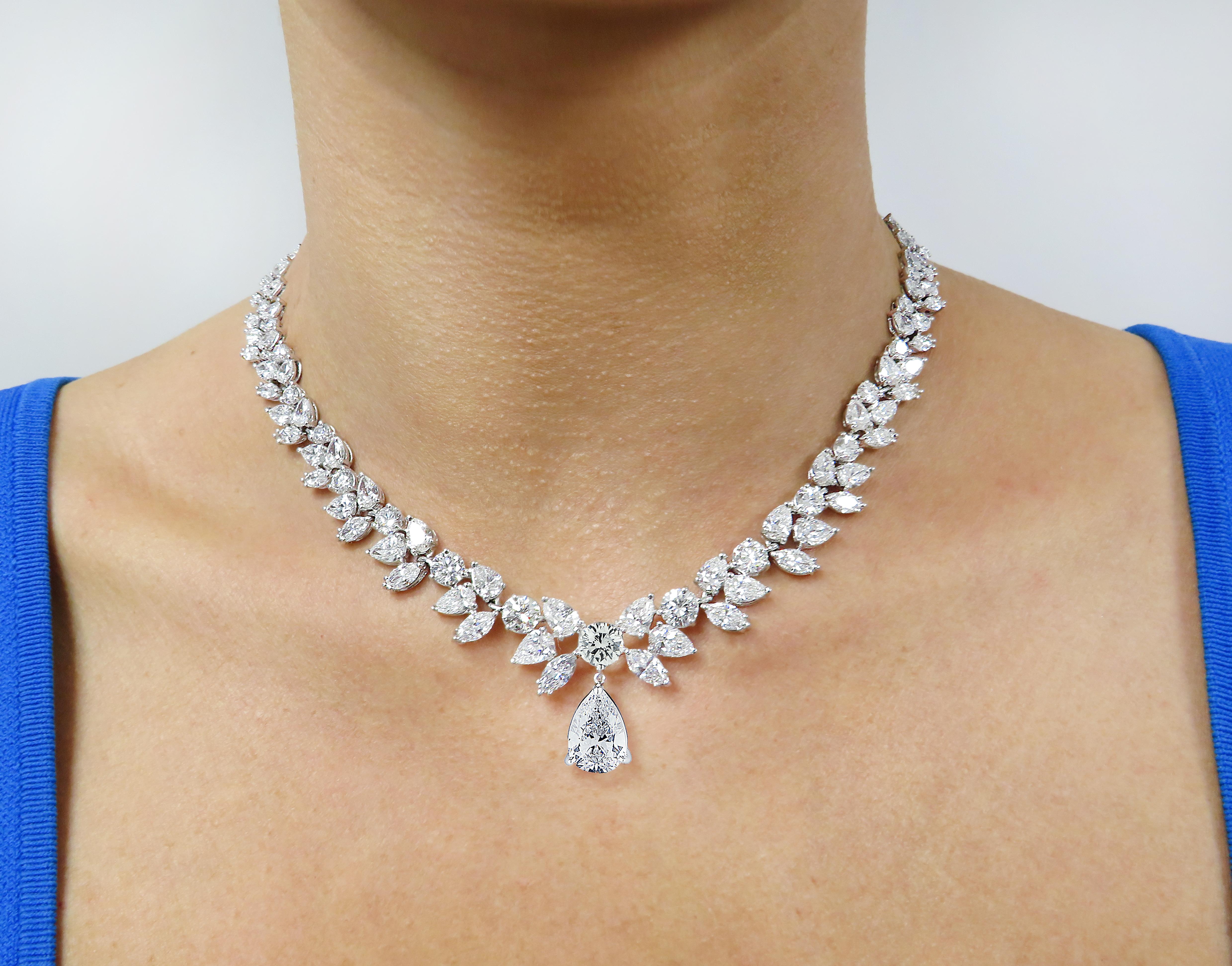 Sensational Vivid Diamonds diamond necklace, finely crafted in platinum, showcasing pear shape, marquise and round brilliant cut diamonds weighing approximately 40.10 carats total, D-E color, VVS-VS clarity, 12 of which are certified by the GIA. The