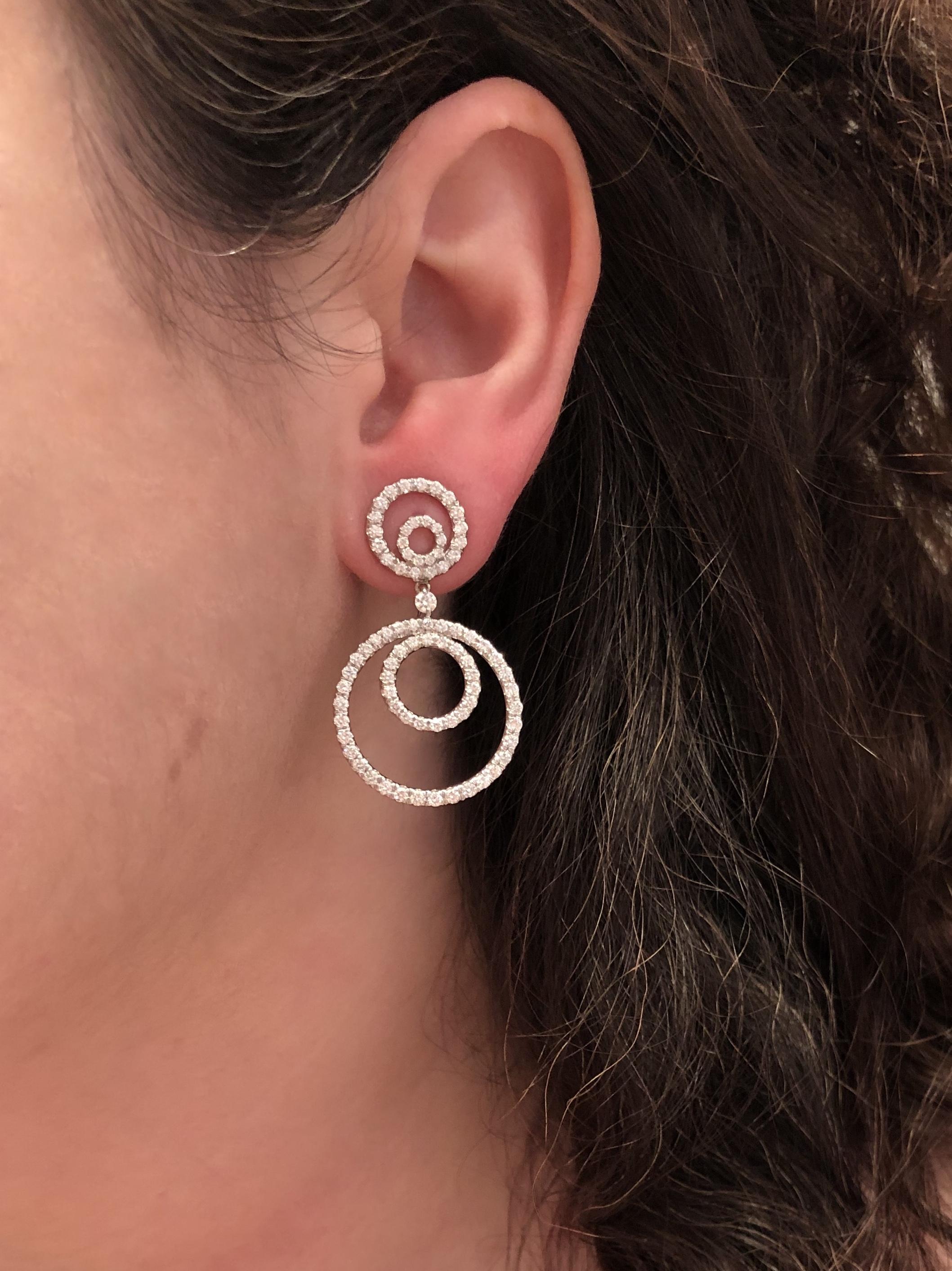 18k White Gold Diamond Pendant Earrings, Signed Kwiat

These diamond earrings are from the Contorno Collection with 162 round brilliant diamonds totaling 2.56 carats, FG/VS@ mounted in 18k white gold.  The original retail was $12,100

Since 1907,