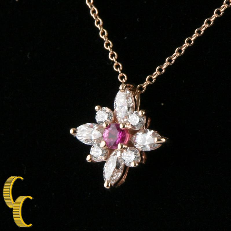 Gorgeous Trademark Star Pendant by Kwiat
Features 18k Rose Gold Setting & Chain and Center Pink Sapphire to Commemorate Breast Cancer Awareness
Includes 16