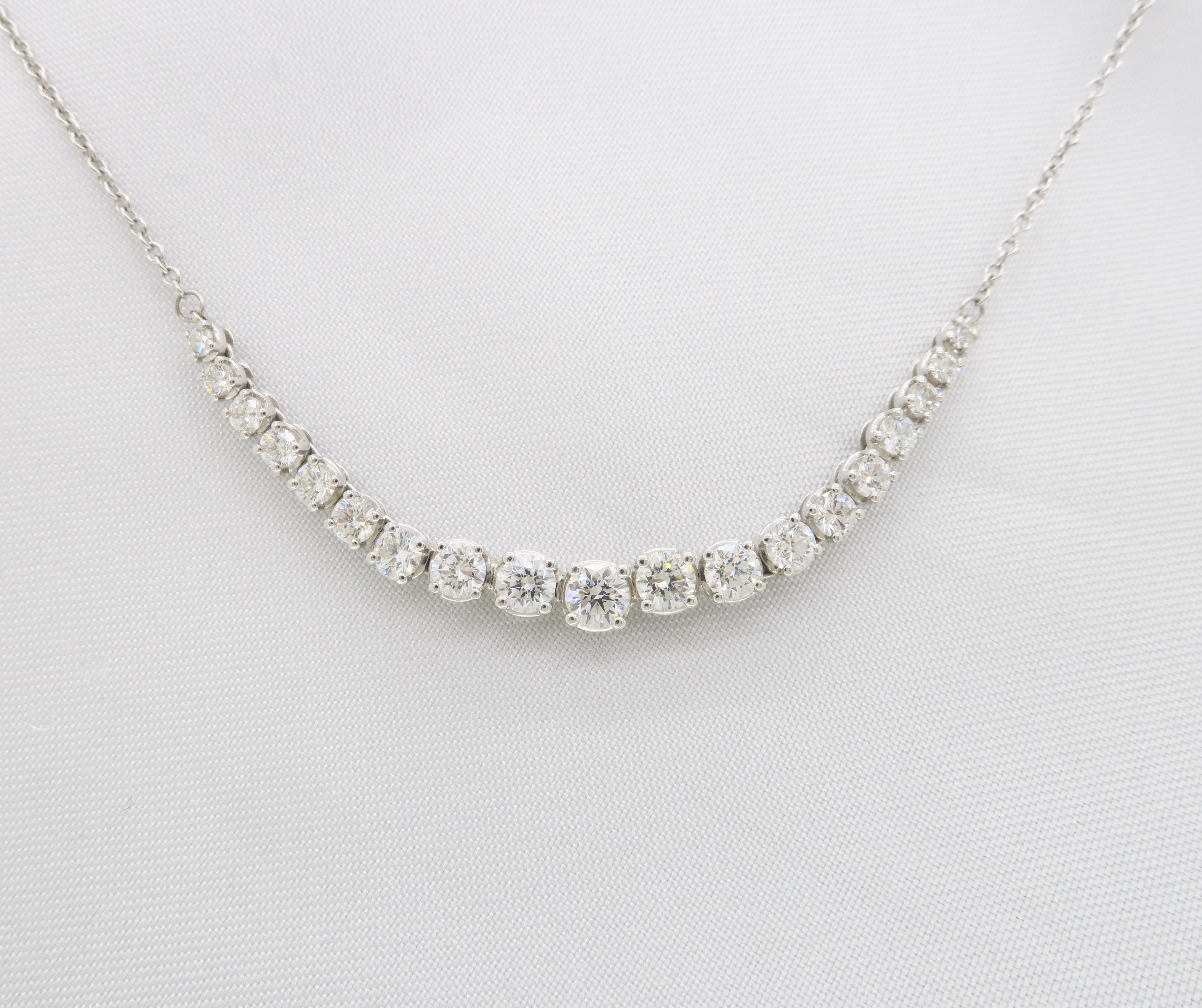 KWIAT Demi-Riviera necklace made in 18k white gold with 1.00CTW of Round Brilliant cut diamonds. 

Total Diamond Carat Weight: 1.00CTW
Diamond Cut: Round Brilliant Cut 
Color: Average F-G
Clarity: Average VS-SI
Metal: 18K White Gold
Stamped: