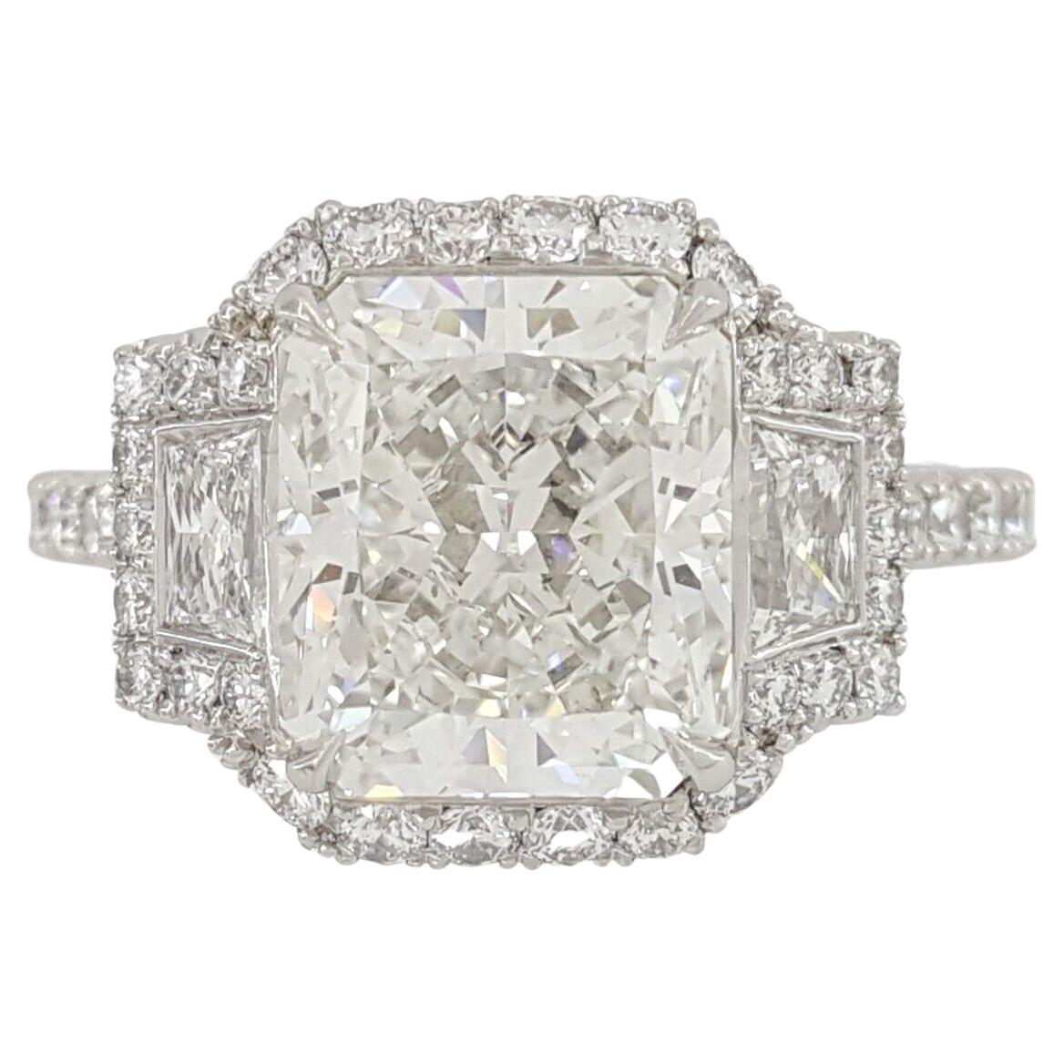 Radiant Cut Kwiat Diamond Halo Three Stone Engagement Ring in Platinum For Sale