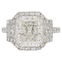 Kwiat Diamond Halo Three Stone Engagement Ring in Platinum