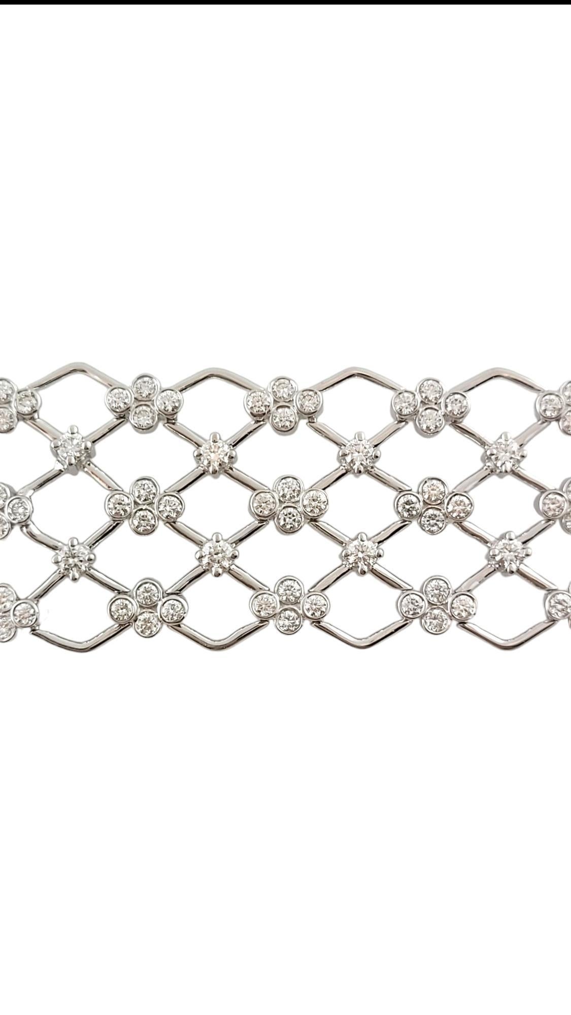 Kwiat Jasmine 18 Karat White Gold Diamond Lattice Bracelet

This stunning Kwiat bracelet was crafted from 18 karat white gold and is decorated with 210 beautiful round brilliant cut diamonds that will make you sparkle!

Approximate total diamond