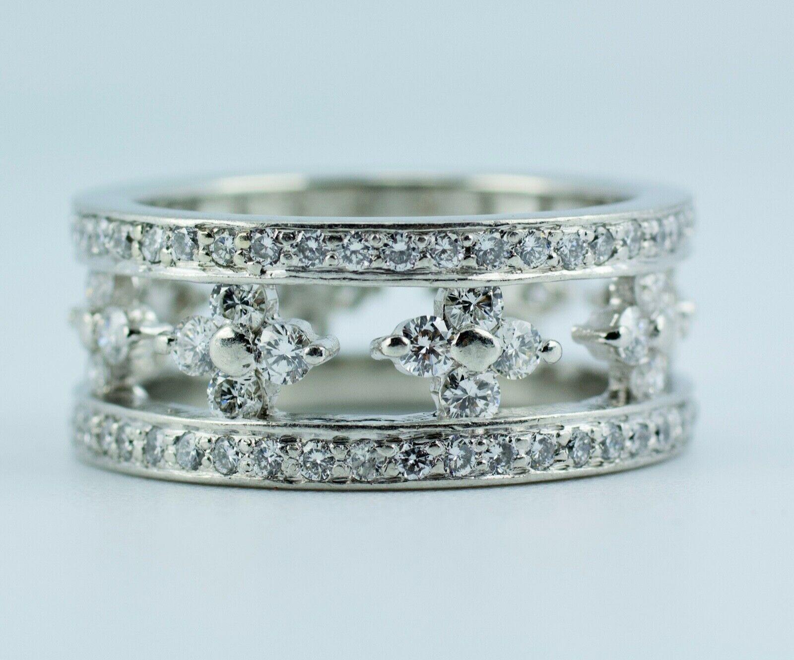 KWIAT Platinum White Round Diamond  Eternity Band
Ring Size 6.25
10.2 Grams
Round White Brilliant Cut Diamonds 1.79 Carats Total Weight
Color: G-H 
Clarity:VS2-Si1
This is a beautiful diamond band that shows off these white round diamonds.  This is
