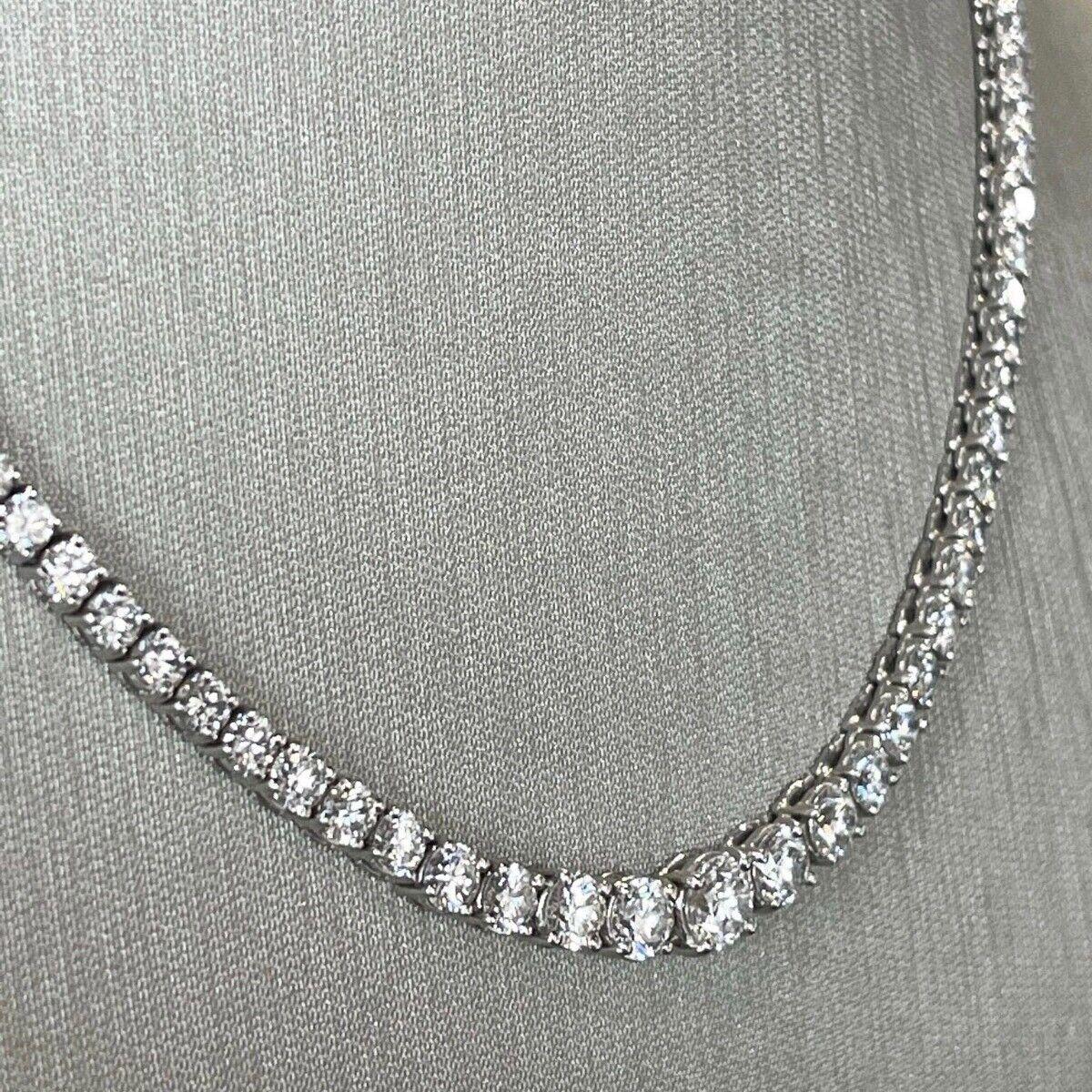 RETAIL PRICE: $65,000.00 + TAX

Brand: KWIAT

Collection: Riviera

Style: Tennis Necklace, Graduated Diamonds

Stones: 100 KWIAT Tiara cut diamonds (exceeding the GIA standards for an Excellent cut, ensuring that every stone looks bigger and