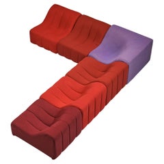 Kwok Hoi Chan para Steiner Sofá modular "Chromatic" en colores rojo púrpura