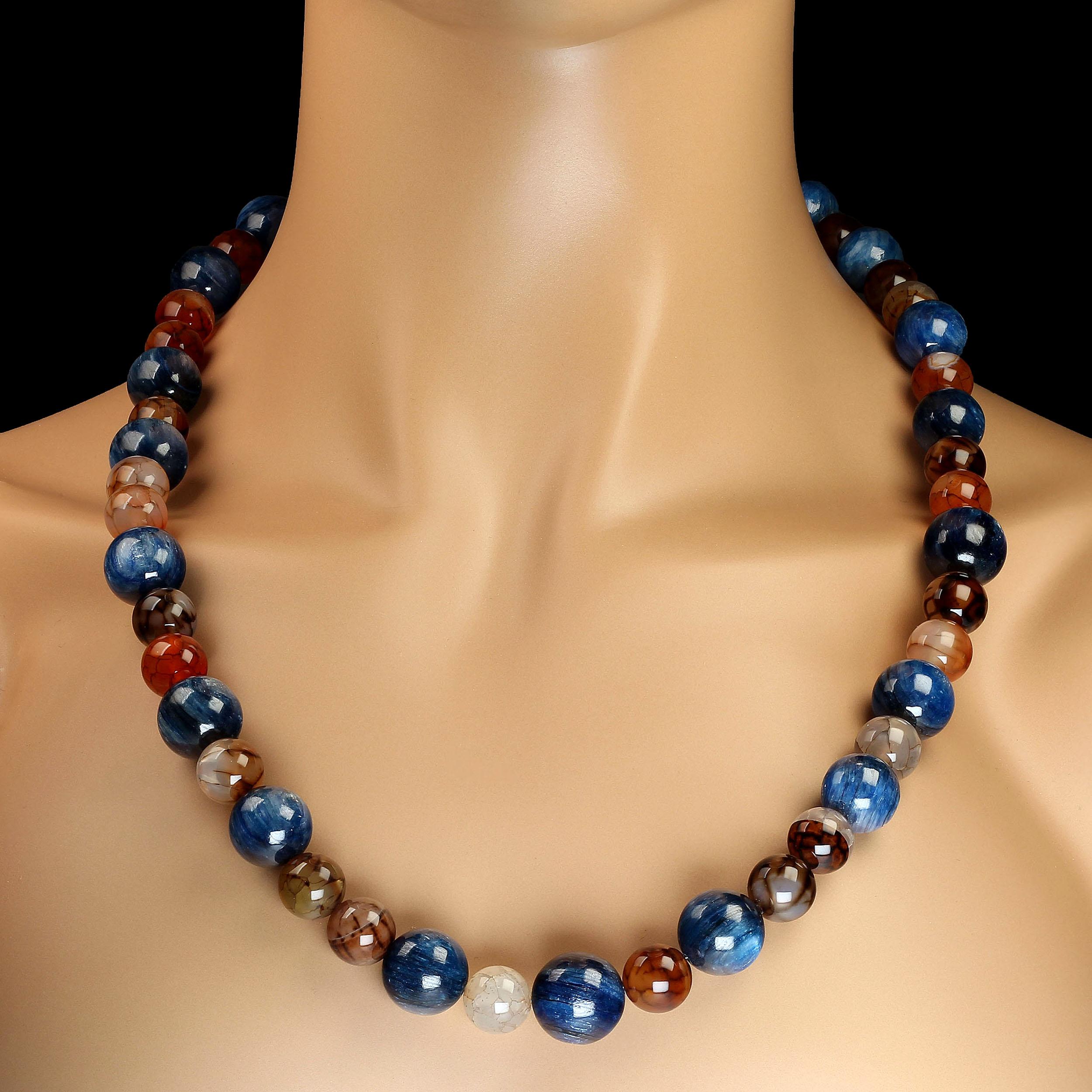 Fantastic necklace of chatoyant blue Kyanite and multi color Spiderweb Jasper.  This 25 inch  necklace is a delight to wear.  Blue and brown is a perfect combination especially in these highly polished gemstones. Wear this glowing necklace and