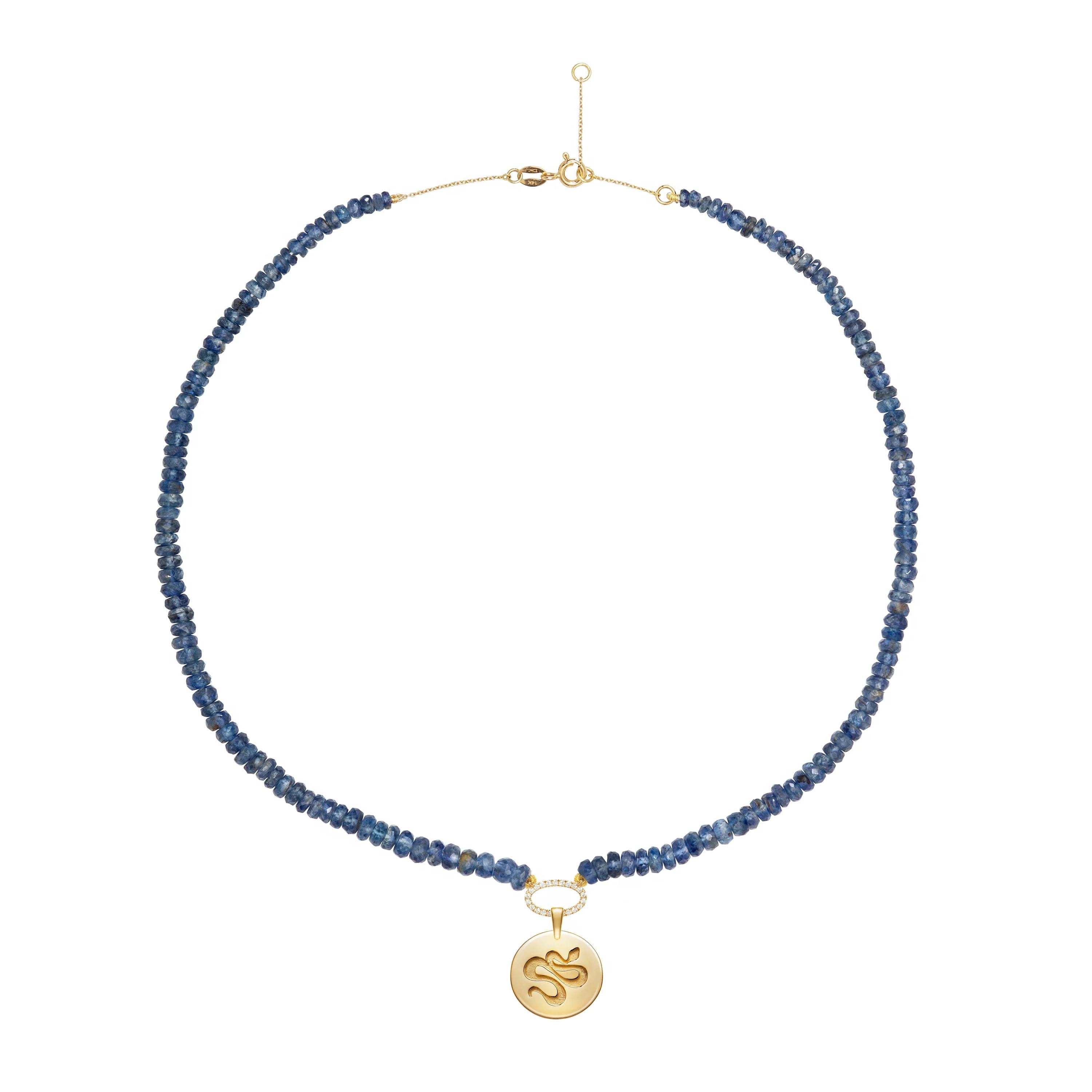 Elevated new hippie collection with semi precious stones. 

14k yellow gold coin snake kyanite beads.