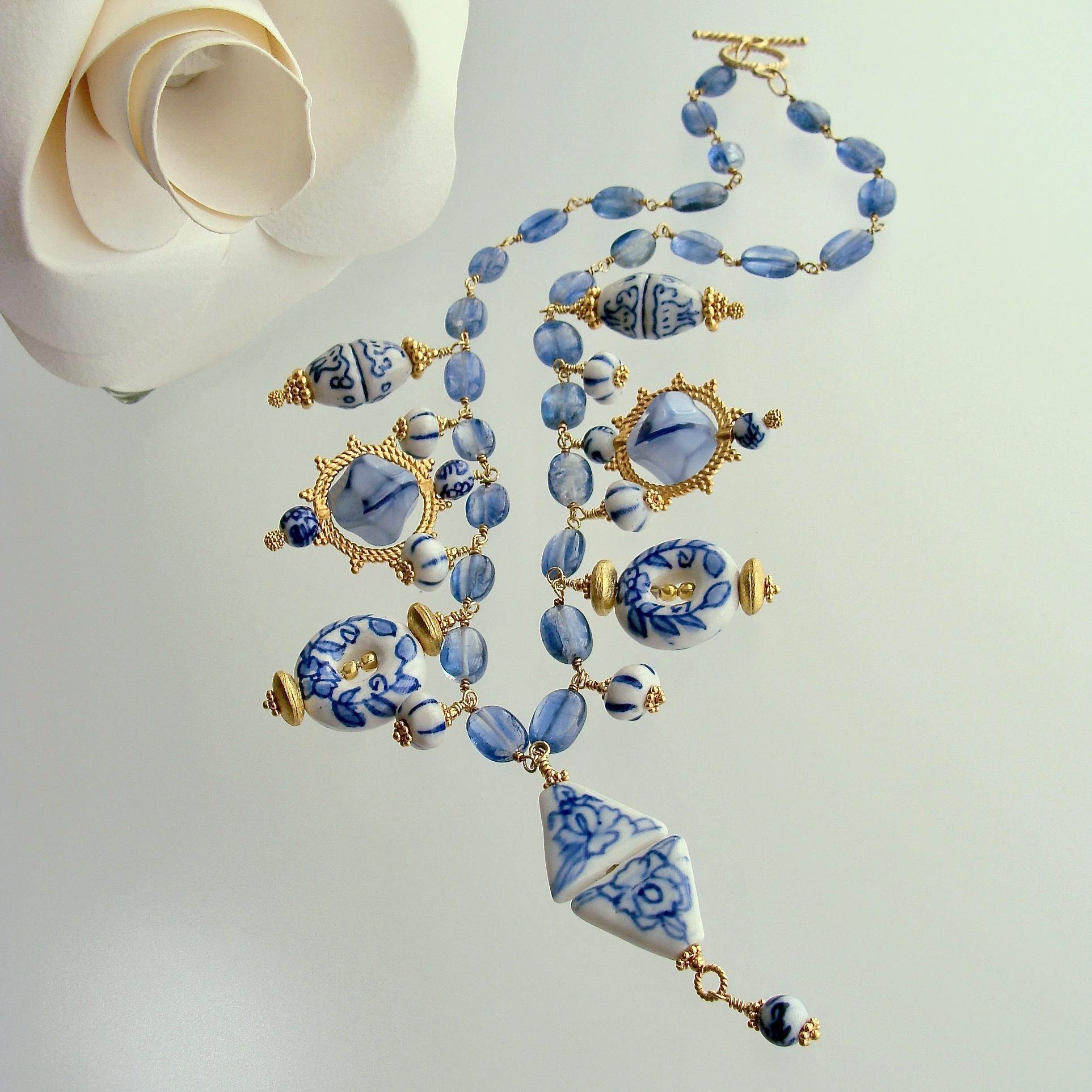 Blue and white themes are universally popular whether in interior design or jewelry.  Such is the case with this whimsical and charming kyanite blue necklace.  Various shades and sizes of blue and white Chinese porcelain beads are accented with