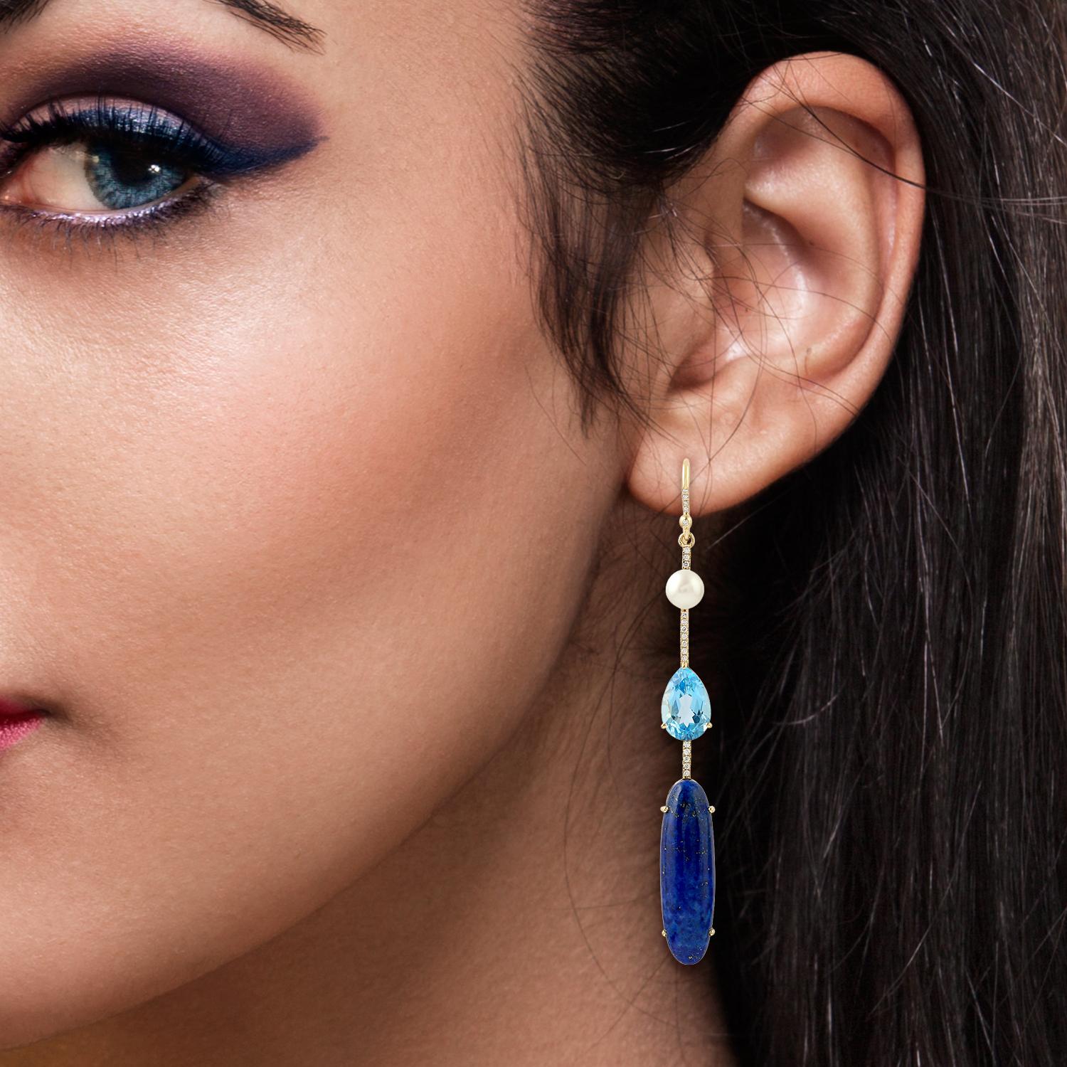 These beautiful linear drop earring are handcrafted in 18-karat gold. It is set with 12.45 carats Lapis, 8.75 carats turquoise, 5.08 carats Kyanite and .22 carats of glimmering diamonds.

FOLLOW  MEGHNA JEWELS storefront to view the latest