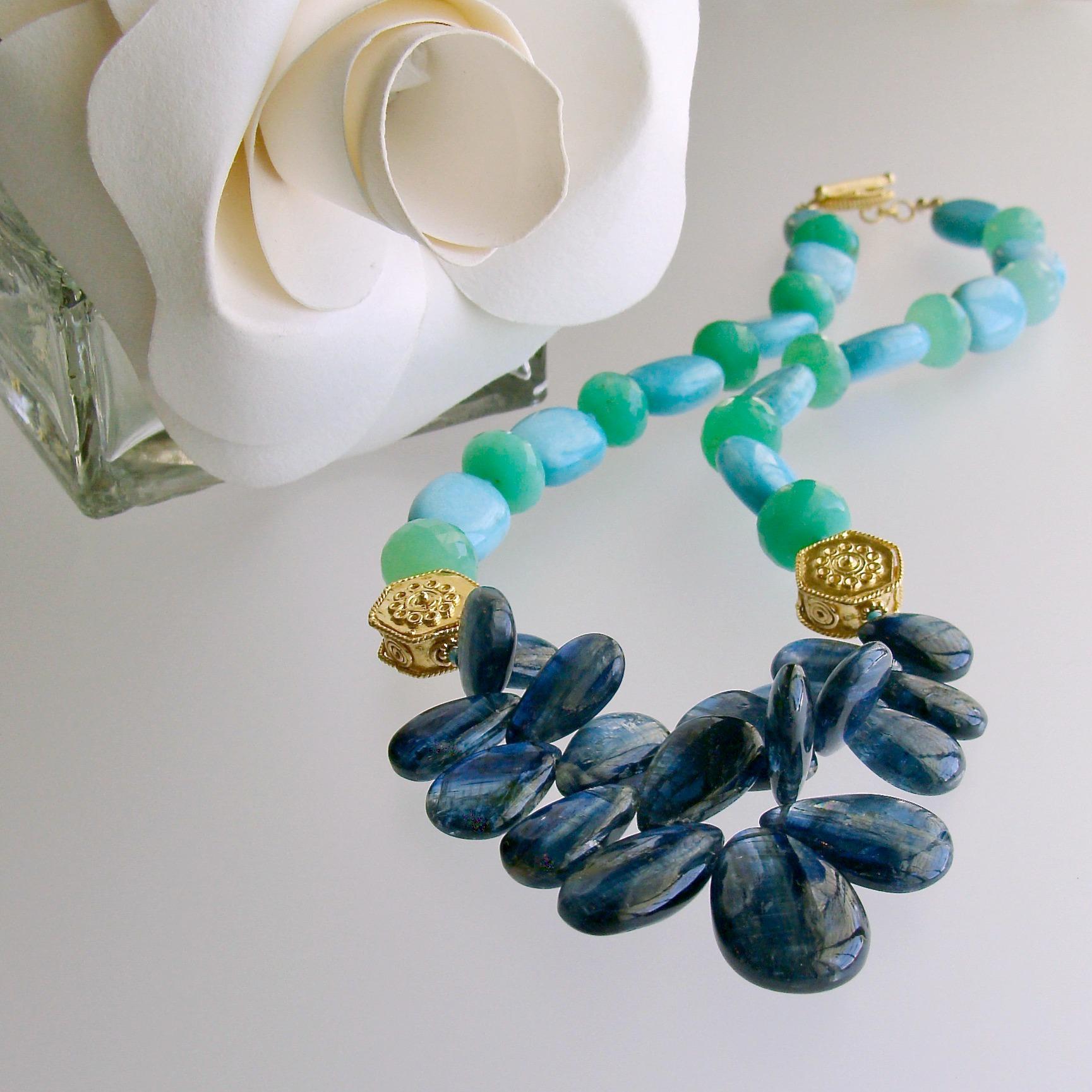Huge kyanite briolettes in Panatone’s gorgeous 2020 Color Of The Year, Classic Blue, are the focal point of this stunning statement necklace.  This cluster of drama is intercepted with large gold vermeil hexagon beads and juxtaposed with luxe Spring