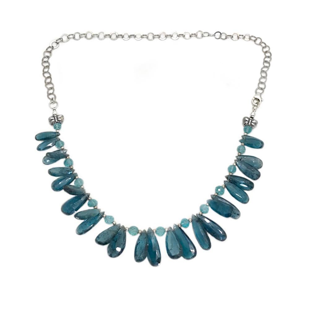 This is a translucent kyanite with sterling chain bib bnecklace. We created this deep sea blue necklace with very rare up to 19 x 8 mm faceted pear cut translucent kyanite, 5 mm faceted aquamarine balls and 1.5 mm sterling beads as spacers. There