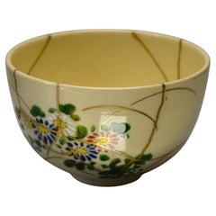 Kyo chawan with flowersand Kintsugi