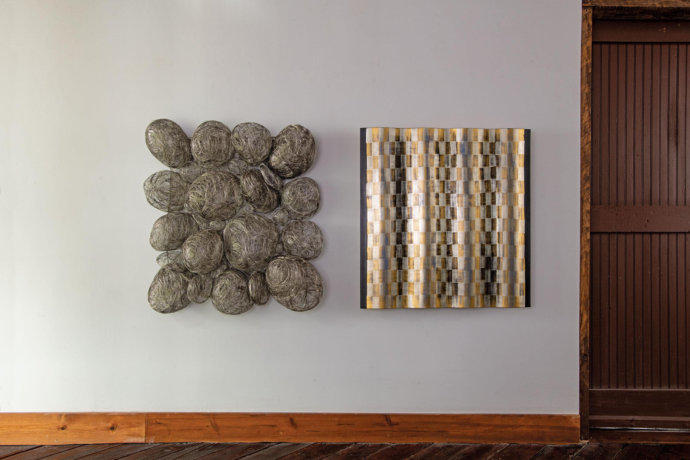 This steel thread woven wall sculpture was constructed by Japanese fiber artist, Kyoko Kumai.

