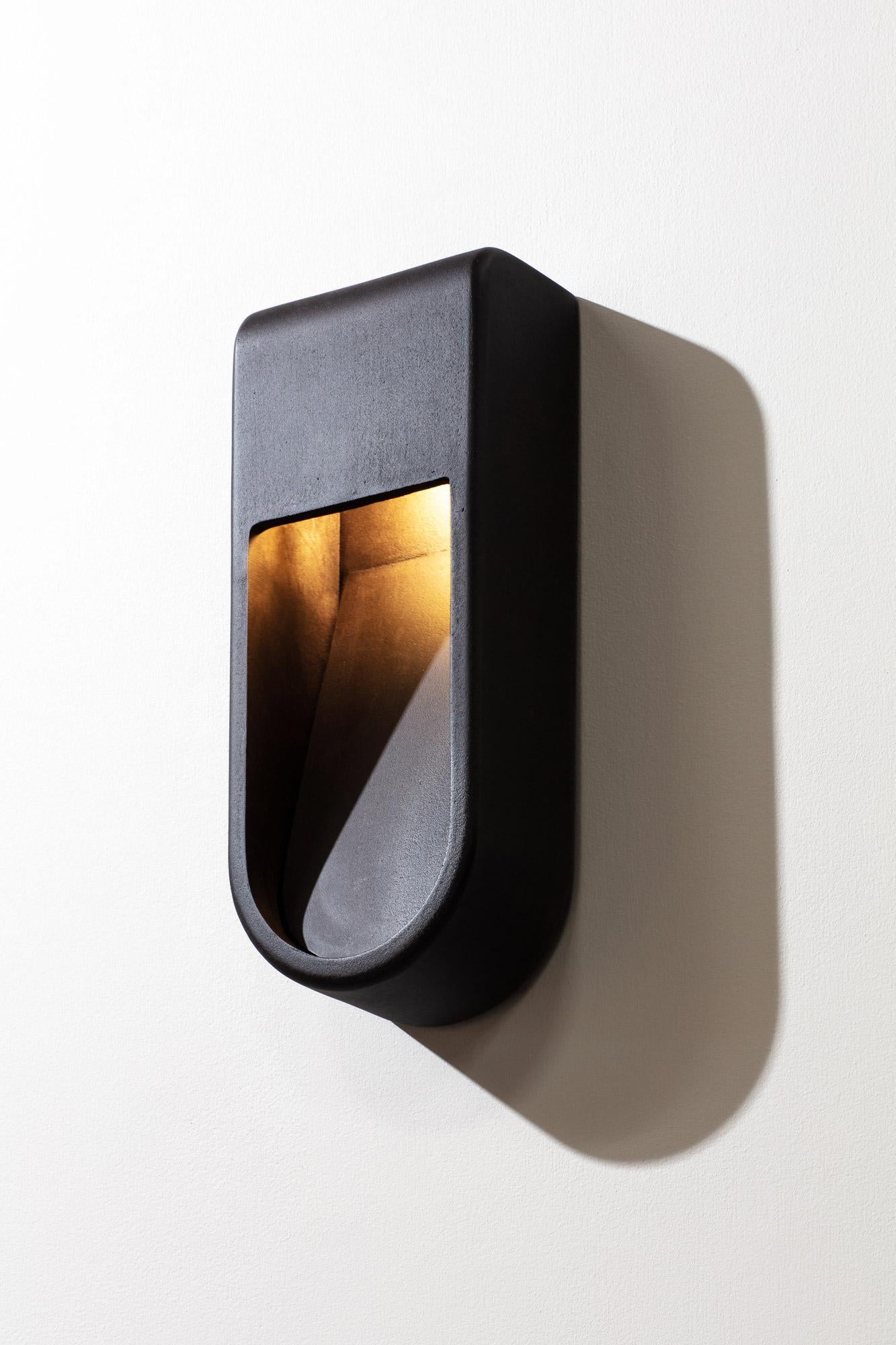 Kyoto is a unique outdoor/indoor lamp collection. Sand cast in poured Aluminum, and finished in bronze, silver or blackened. The sconces are handmade sculptures that are resistant to the elements.
Each piece is individually sand casted and finished