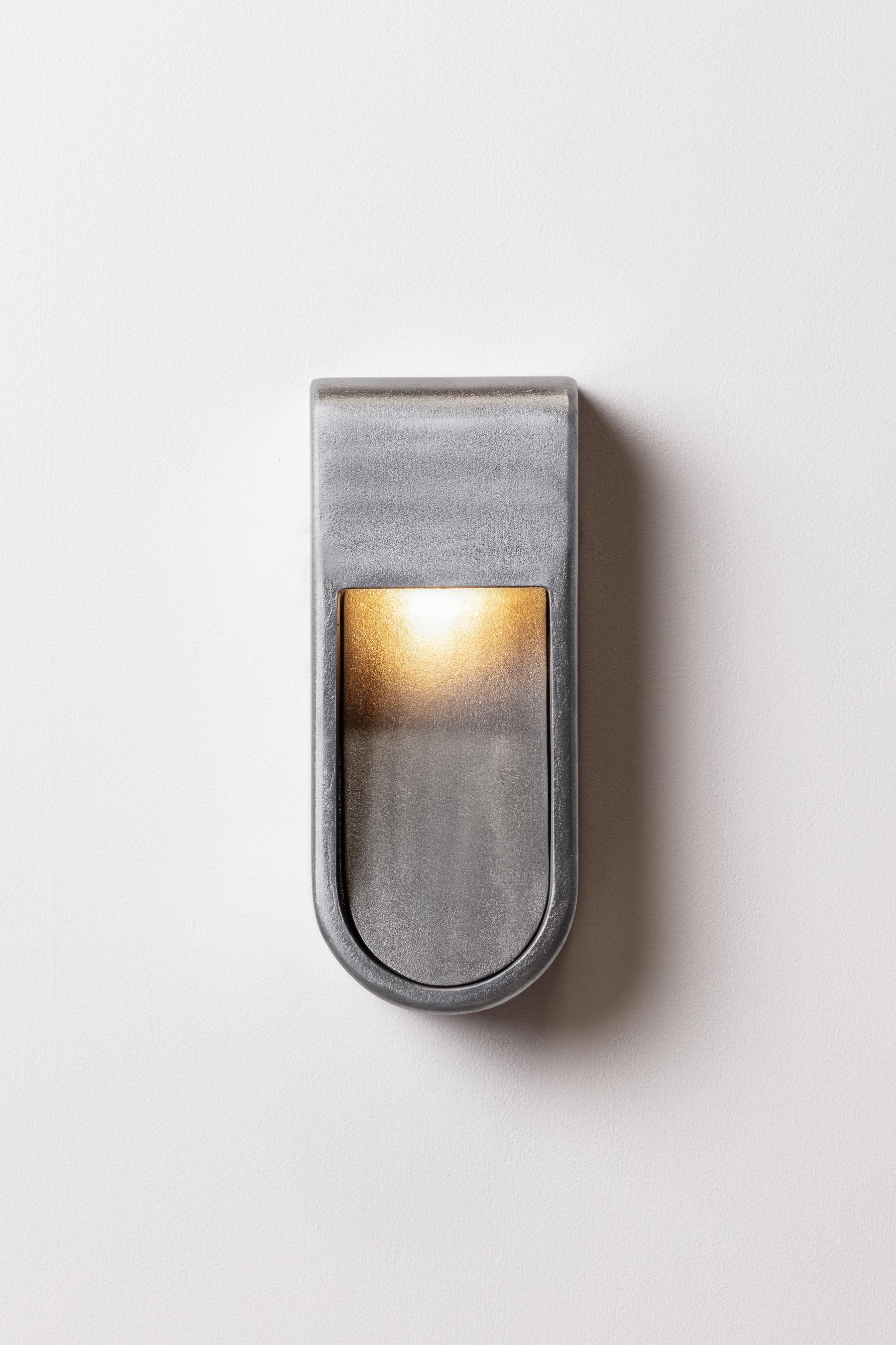 Kyoto is a unique outdoor/indoor lamp collection. Sand cast in aluminum with a raw aluminum finish but available blackened, brass, bronze and silver. The sconces are handmade sculptures that are resistant to the elements.

Each piece is