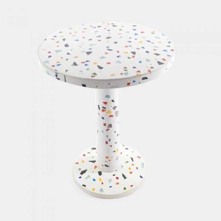 Kyoto end table in metal and terrazzo, designed in 1983 by Shiro Kuramata. 

Shiro Kuramata studied architecture at Tokyo Polytechnic in Tokyo until 1953. Then he spent a year working for Teikokukizai, the Japanese furniture manufacturer. Until 1956