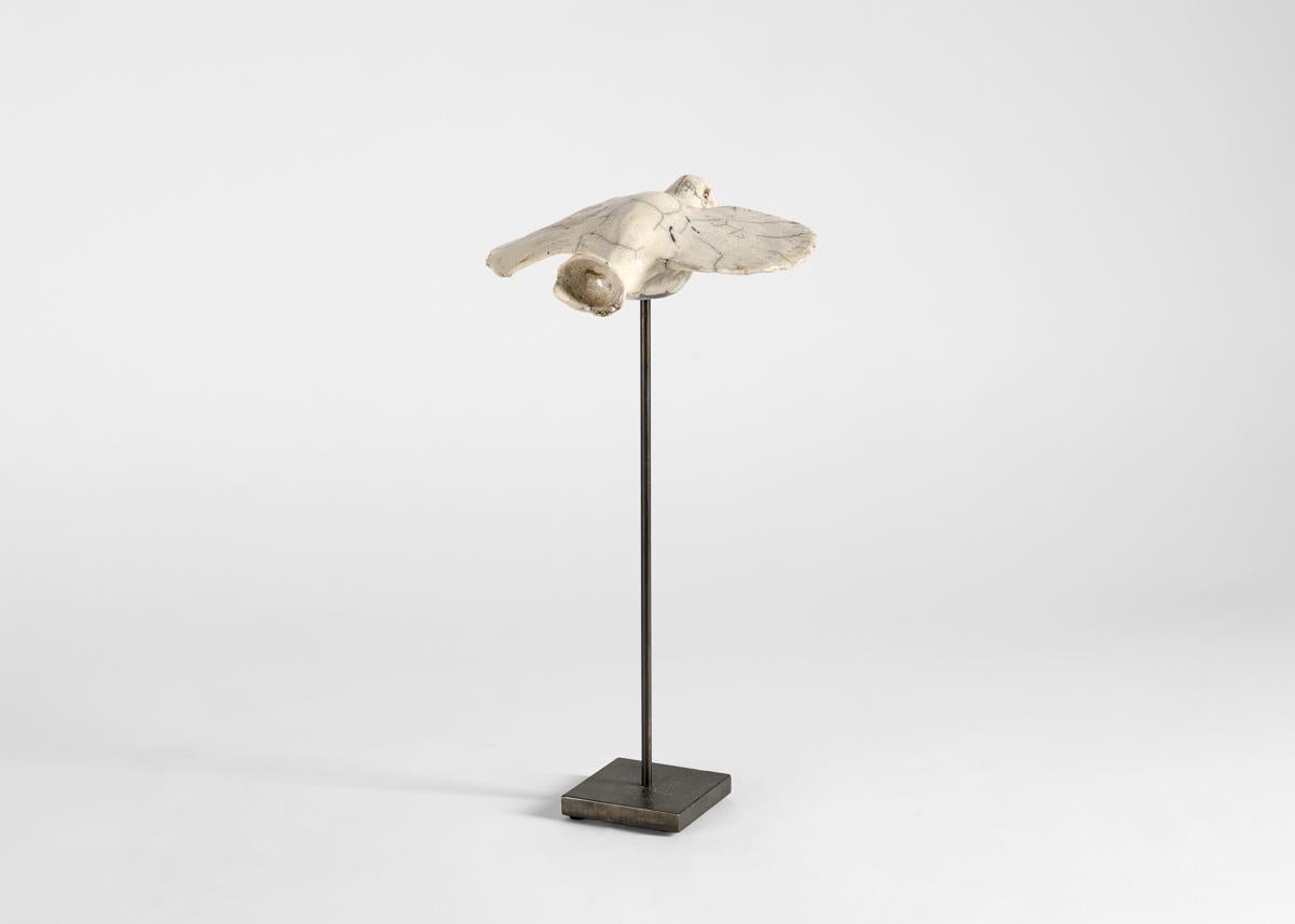 The raku sculptures of Kiriaki Moustaki are inspired by primitive works of early civilizations—soft and luminous, his forms recall the colors and images of Etruscan art and Cretan crafts, and form a kind of dialogue with the memory and traditions