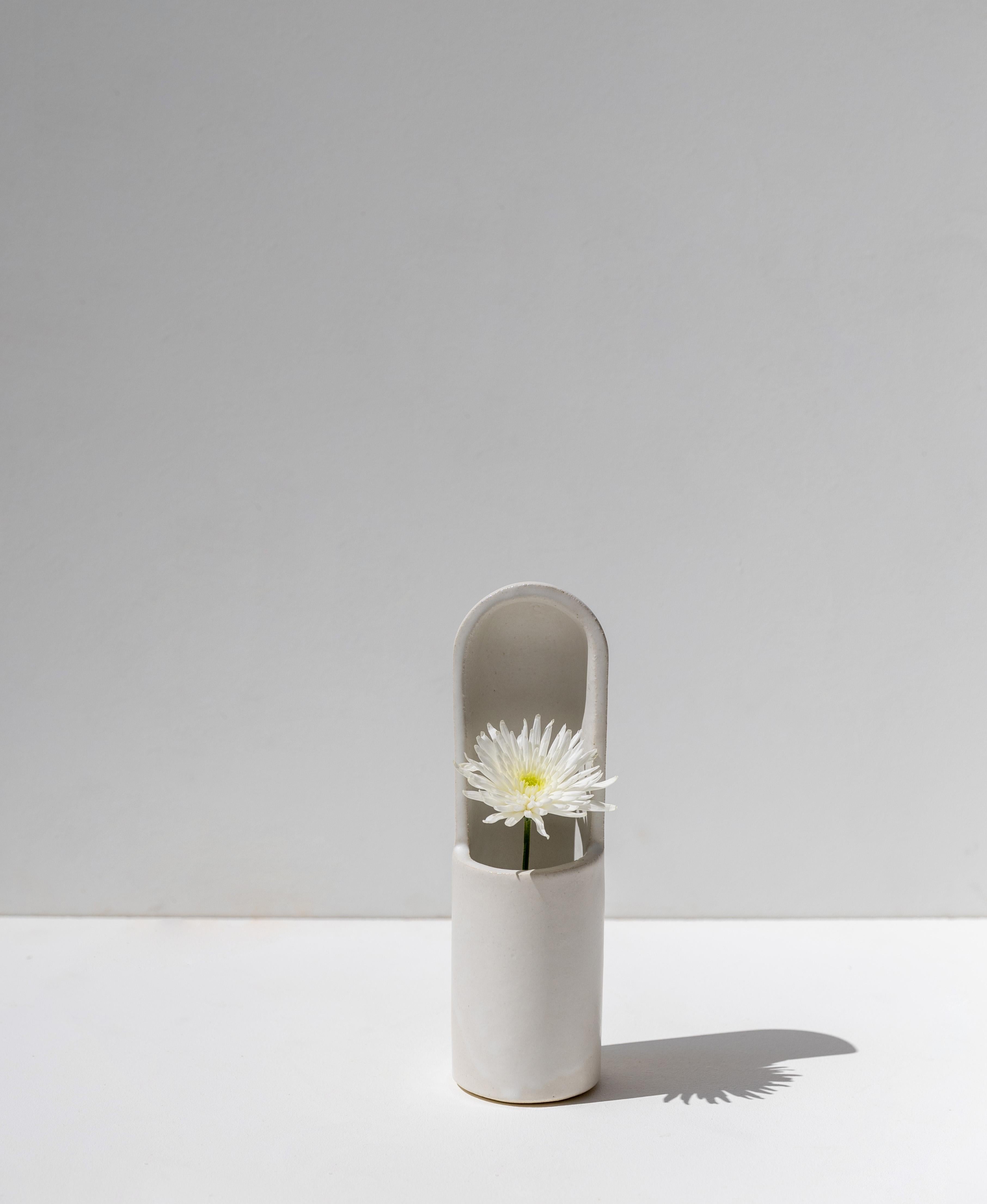 Kyrtos Vase by Lisa Allegra
Dimensions: Ø 8 x H 27 cm.
Materials: Ceramic.
Also available in Blackened gold and Pearl finishes. Please contact us.

Born in 1986 in Paris, Lisa Allegra has earned in 2010 a degree in furniture design from the École
