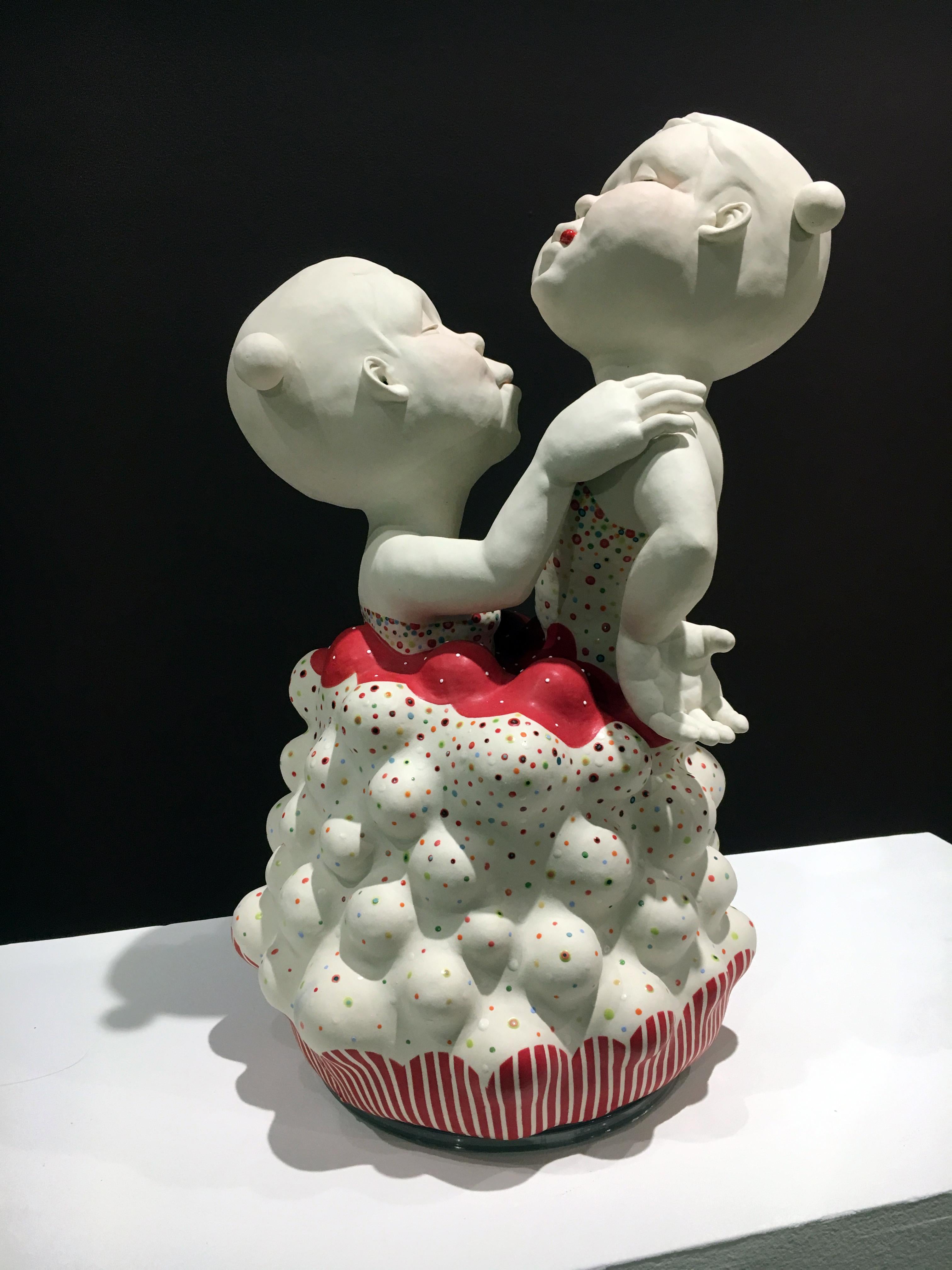 Kyungmin Park is a figurative ceramic sculptor drawing inspiration from childlike perspectives. Contrasting the darker emotions and restricted psyche of adulthood with the boundless consciousness of children, Kyungmin’s sculptures confront the view