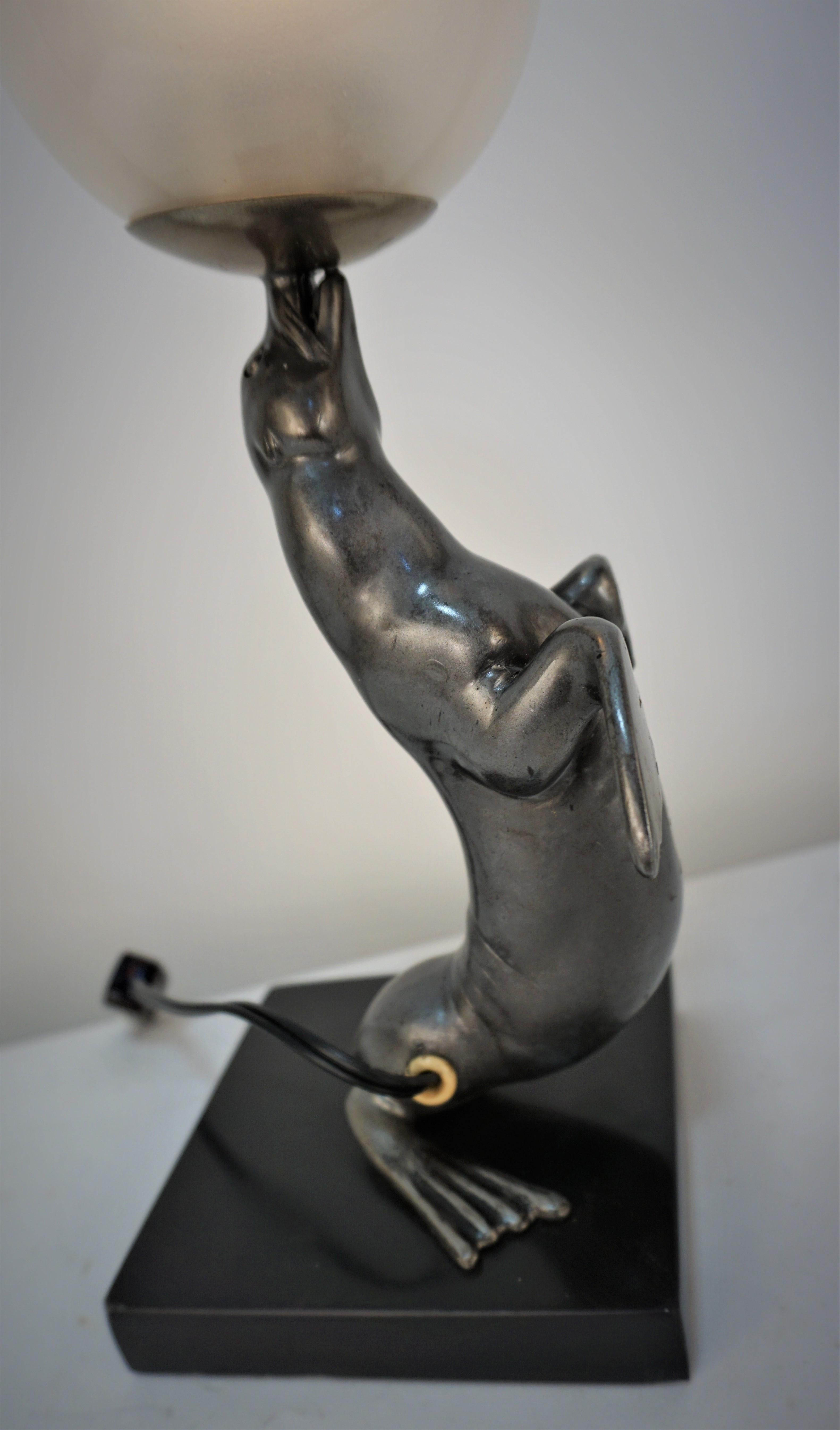 Early 20th Century L. A. Carvin French Art Deco Sea-Lion Lamp Playing with Ball