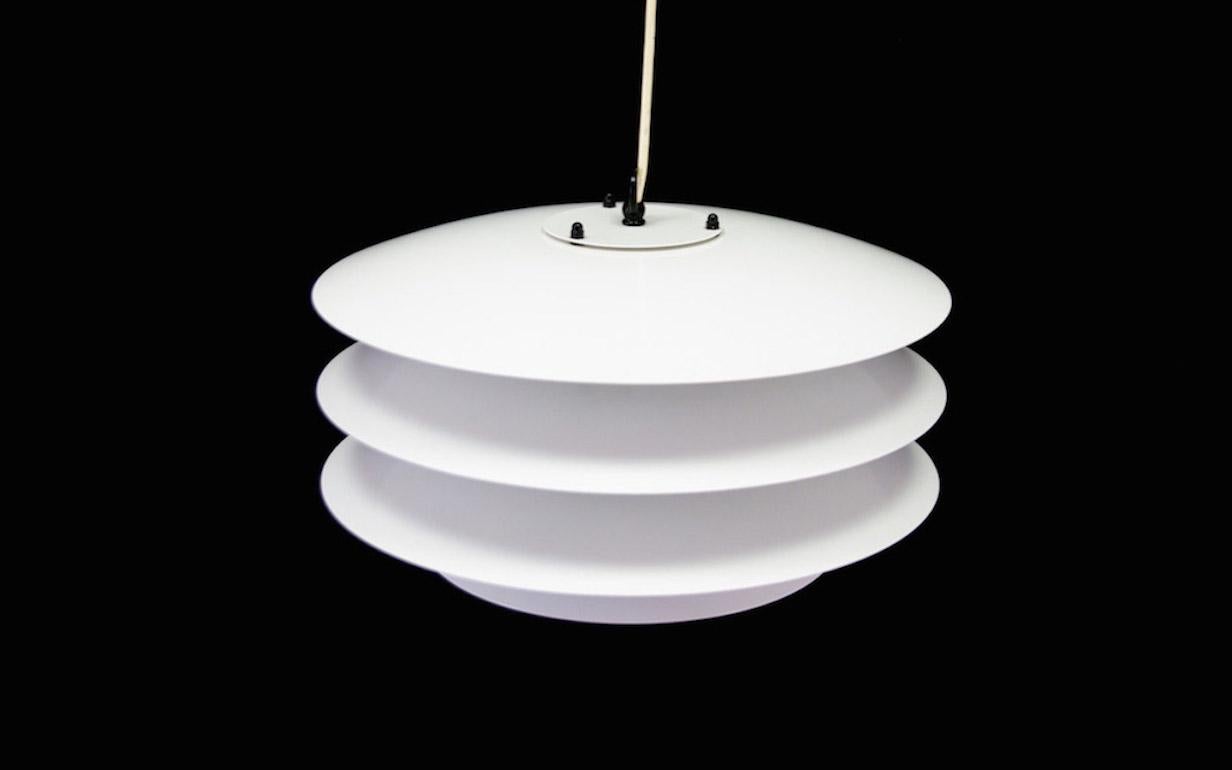 Uncommon lamp from the 1970s-1980s, Danish design, manufactured by Laterna Danica. Lamp made of metal, in white and black color. Preserved in good condition - directly for use, .

Dimensions: diameter 40 cm.