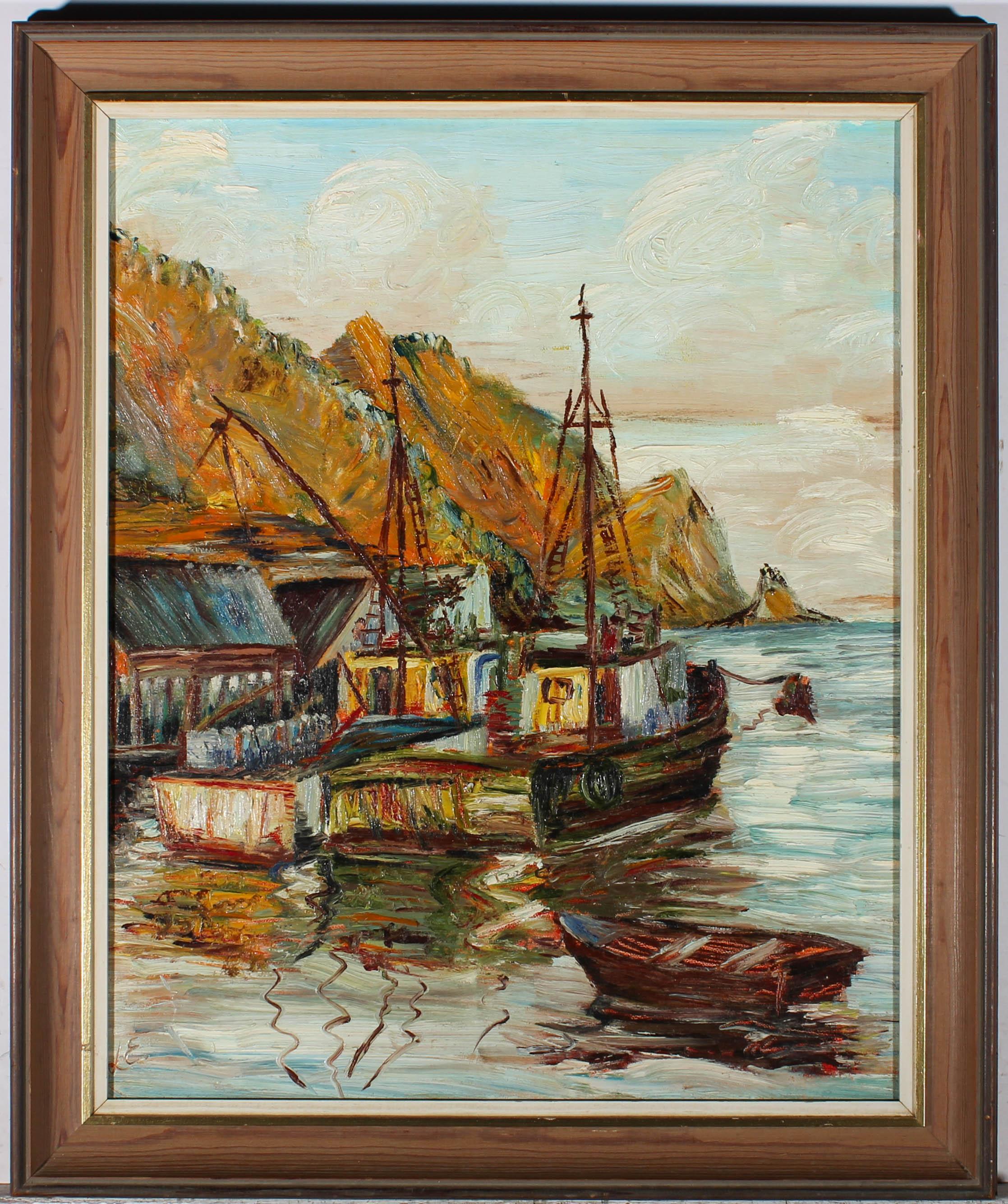 A colourful Mid Century impasto oil showing fishing boats moored in front of vivid orange cliffs. The artist has initialed to the lower left corner and the painting has been presented in a 20th Century wood frame. On canvas board.