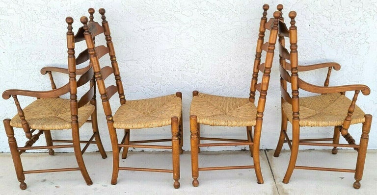 For full item description be sure to click on CONTINUE READING at the bottom of this listing.

Vtg L Hitchcock harvest stenciled ladder back rush seat dining chairs - set of 4
Set includes 2 arm and 2 side chairs.

Approximate measurements in