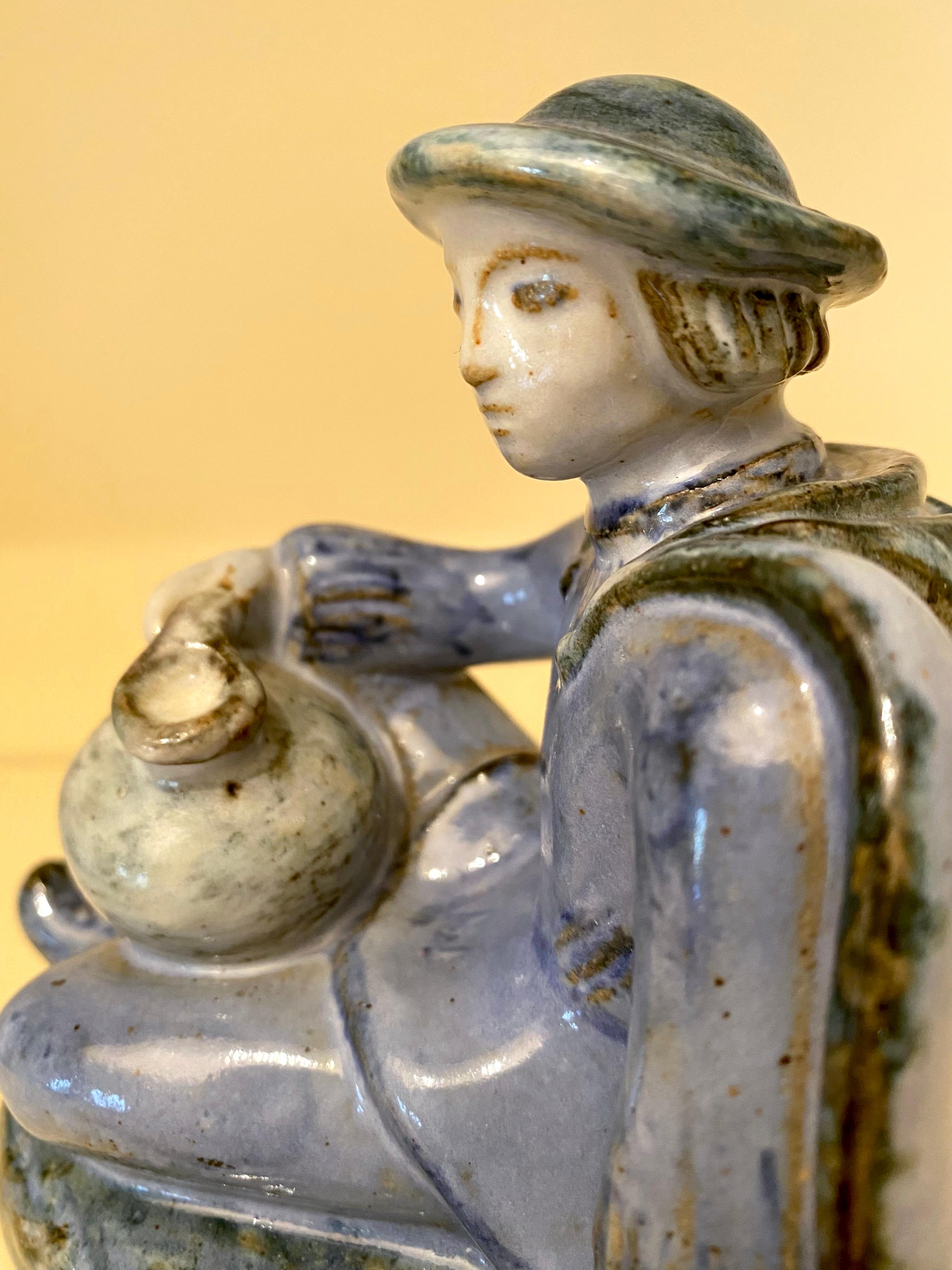 Danish L. Hjorth Ceramic Sculpture of a Boy in Blue For Sale