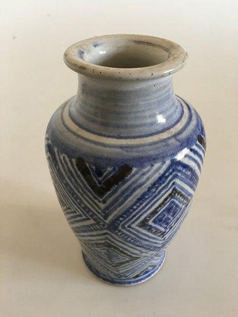 L, Hjorth unique ceramic vase. 

Measures: 16.5 cm H (6 ½). 

In great condition with blue patterned glace.
