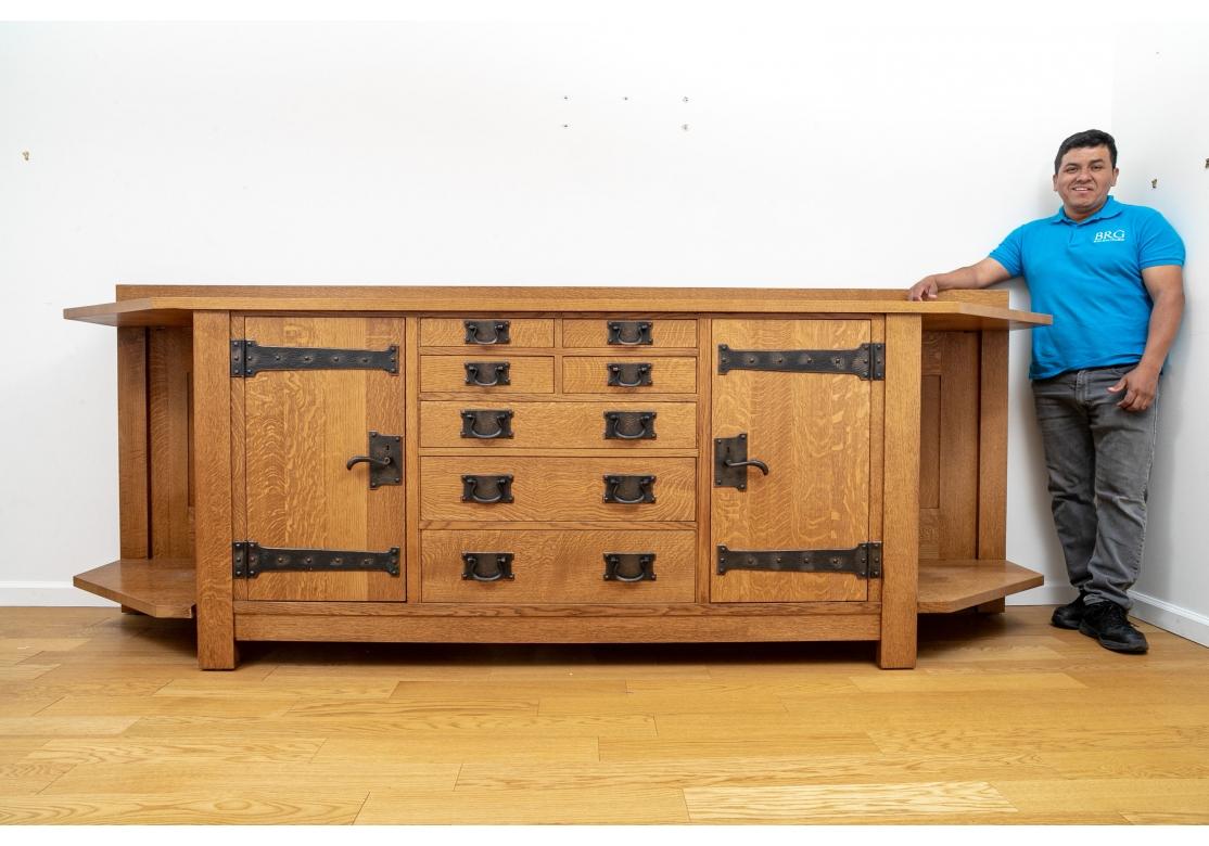 An extraordinary limited edition Oak Sideboard made after the original is an exact replica of the 1900 design from Gustave Stickley's home that is now in the Stickley museum. Made in a very limited edition, this is one of 100 pieces made and bears