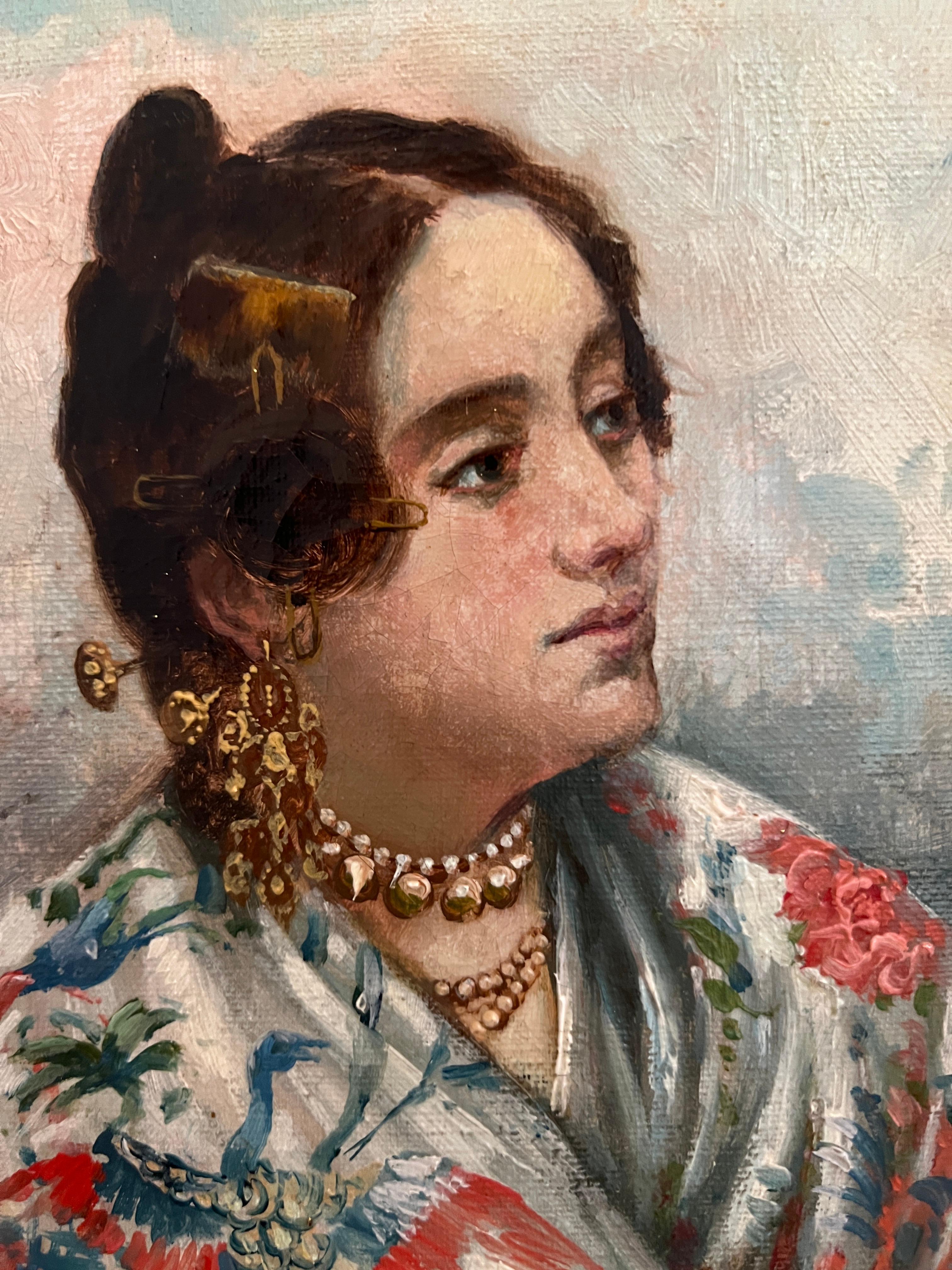 Mujer joven con chal y cesta de flores en venta 4