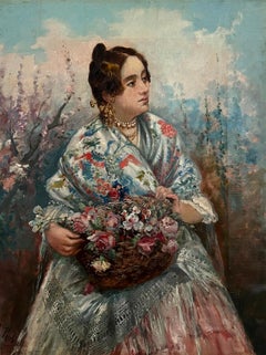 Jeune femme avec châle et panier de fleurs