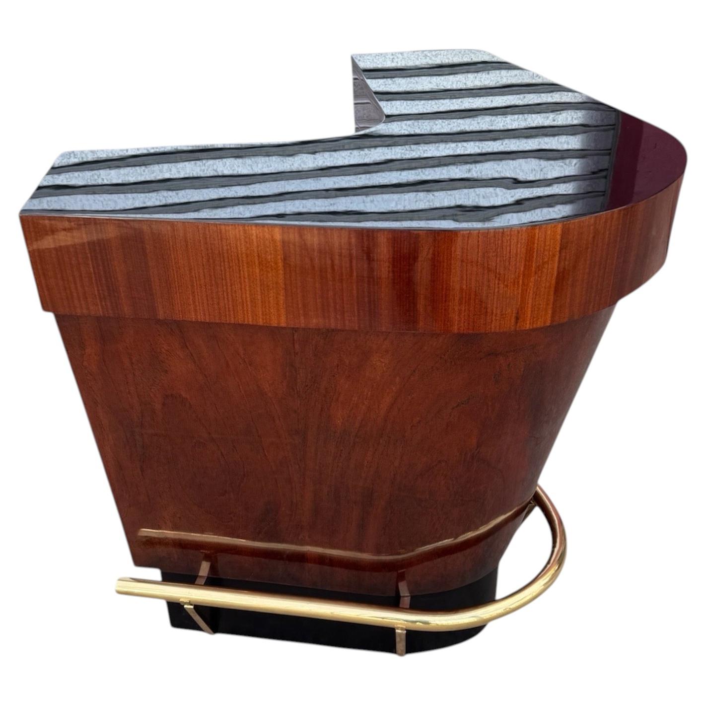 Mobile bar Art Déco a forma di L in legno di radica e lacca nera, 1940 ca.