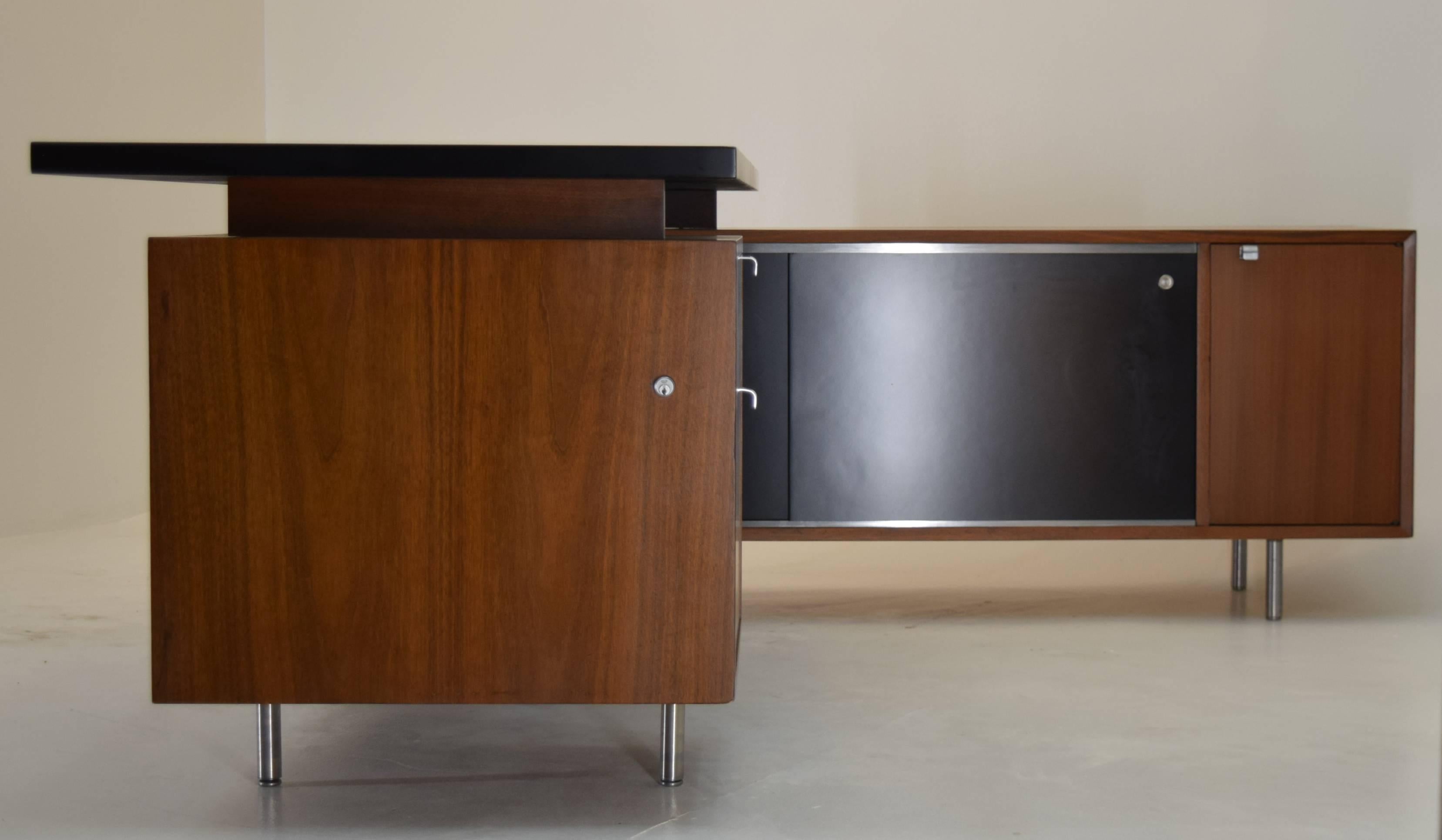 George Nelson, Herman Miller, Executive Office Group Series
circa 1955
Walnut, lacquer, steel, maple
J-Pull knob finger pulls, round legs with feet.
Measures: 72