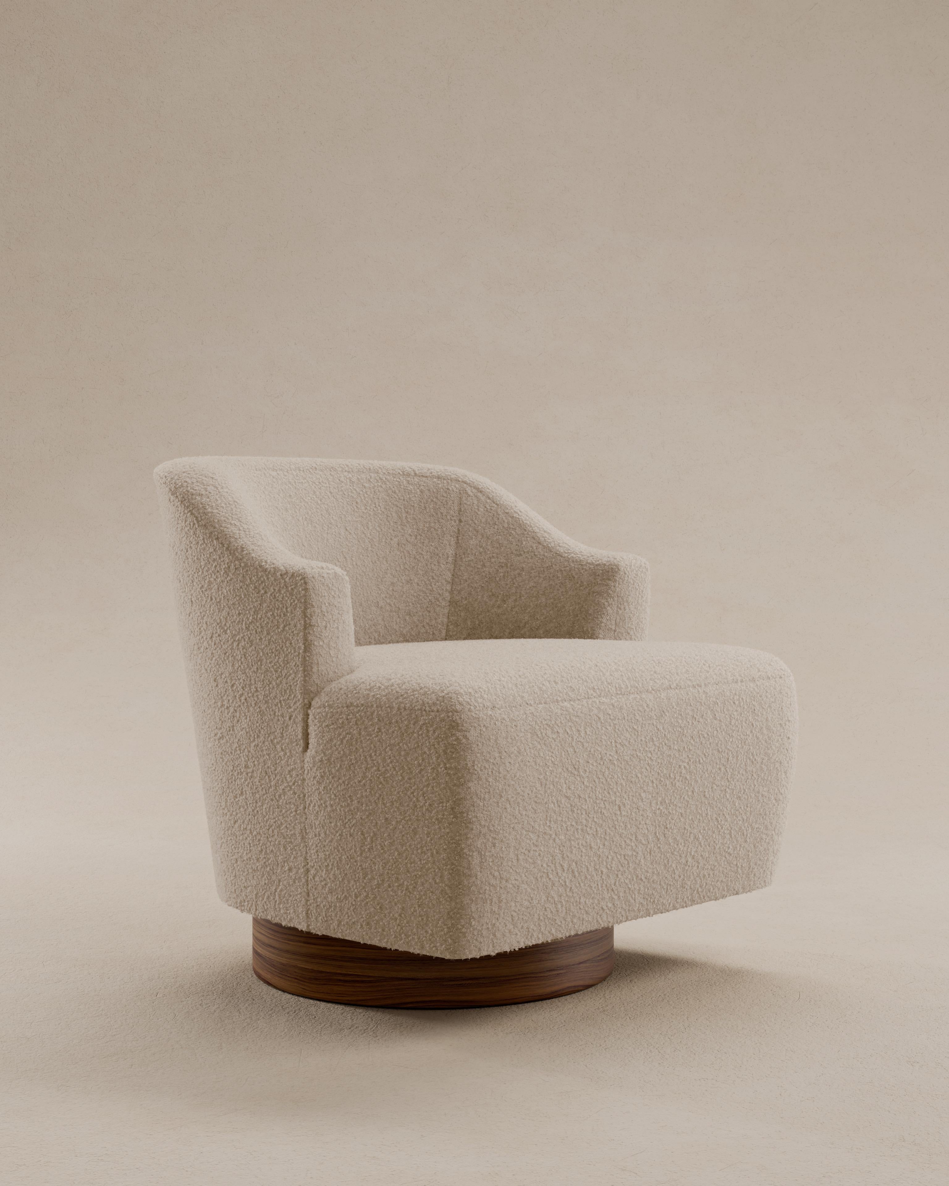 The Grant Lounge Chair is Lusano’s ode to sculptural comfort, an object of quiet power and refined ease. With its bold walnut frame and generous upholstered seat, it balances architectural precision with an inviting softness. The form is both