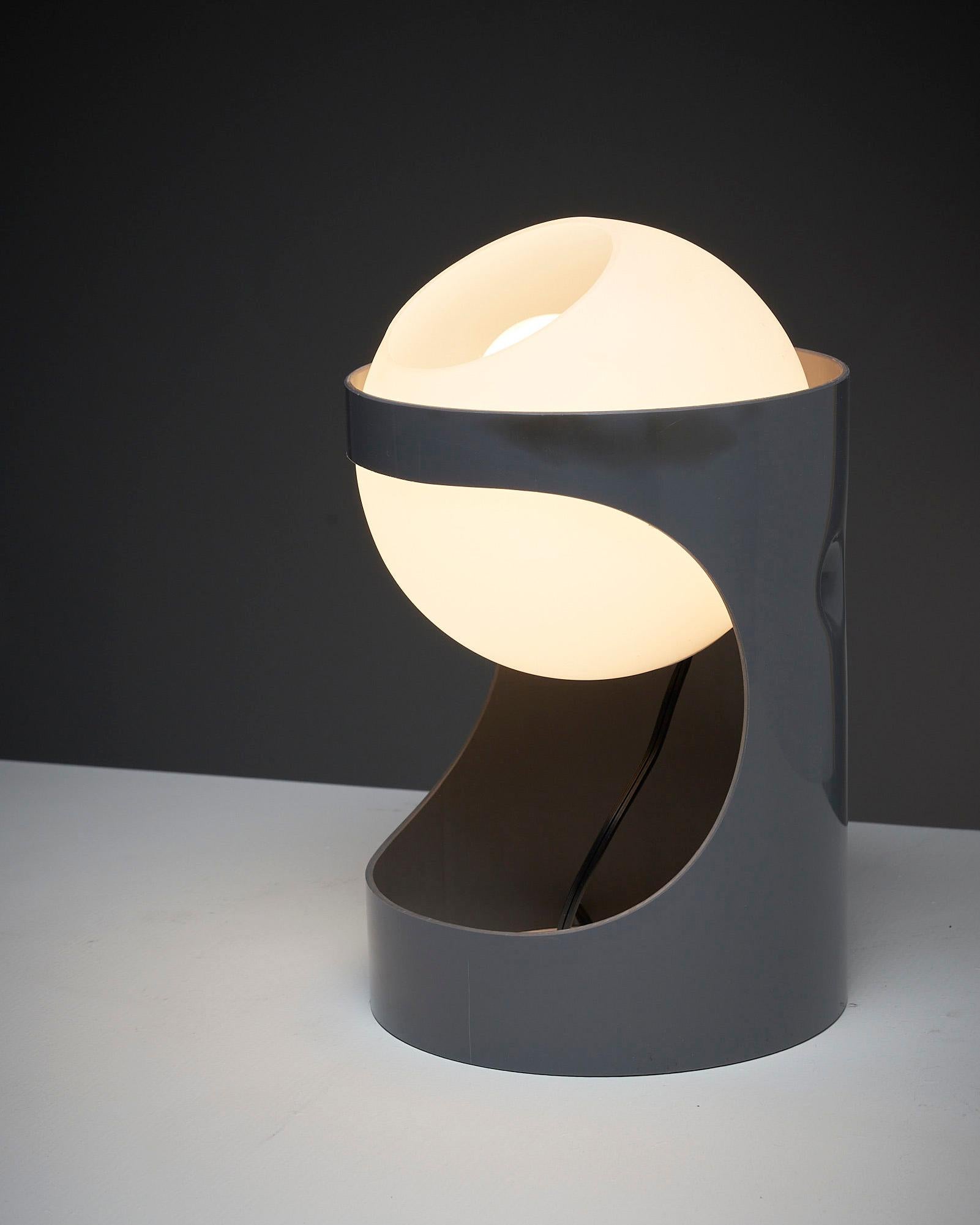 'L1 Guggerli' Table Lamp by Rico and Rosemarie for Baltensweiler AG: Add a touch of space-age charm to your space with the 'L1 Guggerli' Table Lamp. Created by Rico and Rosemarie, this lamp showcases a unique design that combines form and function