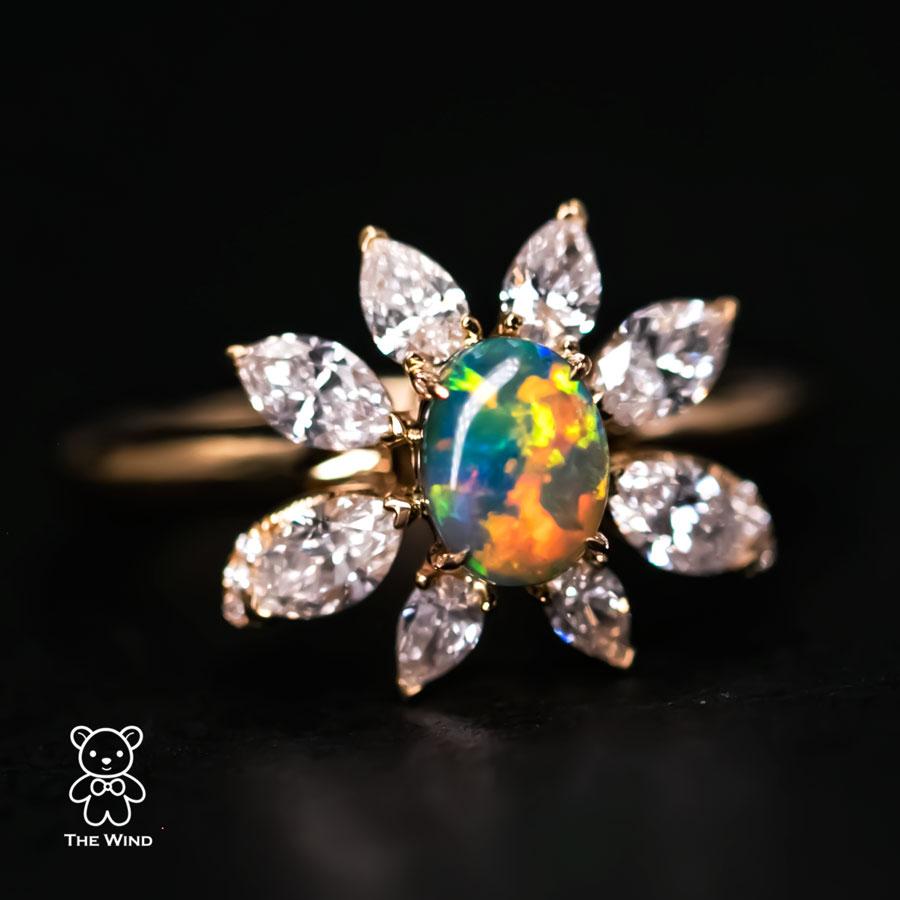 La Angel - B5 Vivid Black Opal Marquise Diamond Engagement Ring 18K Yellow Gold.


Design Name: La Angel
An angelic beauty, perfect for one shining bright like an angel in your life!

Design Idea:
“La Angel” centers around a beautiful 0.63-carat