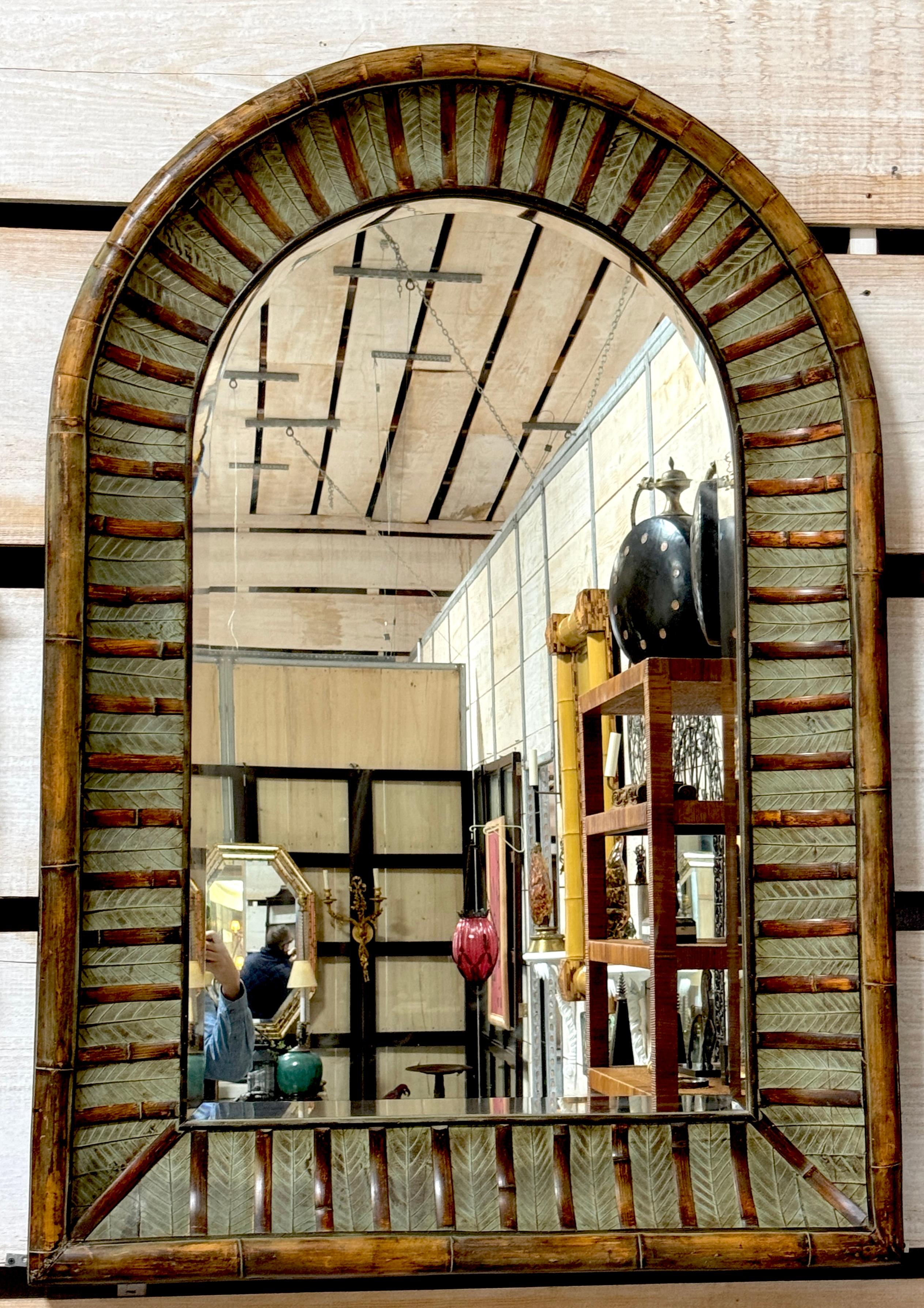 La Barge Arch Top Polychromed Bamboo & Leaf Motif Beveled Mirror 

Attributed to La Barge, Late 20th Century 

This stunning arch-top polychromed bamboo and leaf motif beveled mirror, attributed to La Barge and dating to the late 20th century, is a