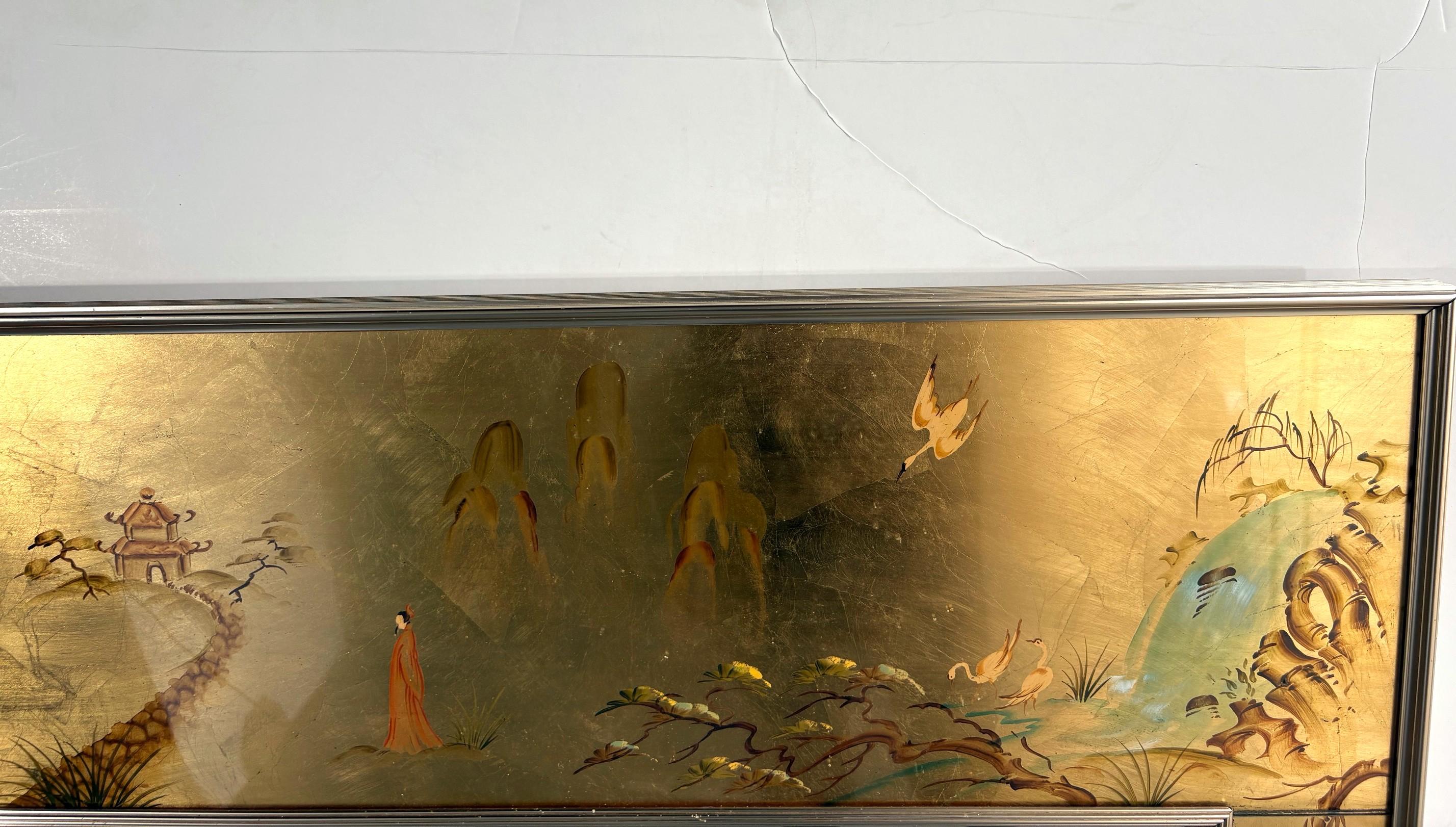 The La Barge hand-painted mirror frame depicts Asian flora and fauna. Chrome anodized aluminum gallery style surround. Signed and dated by the artist, K. Scheibach, 80.
