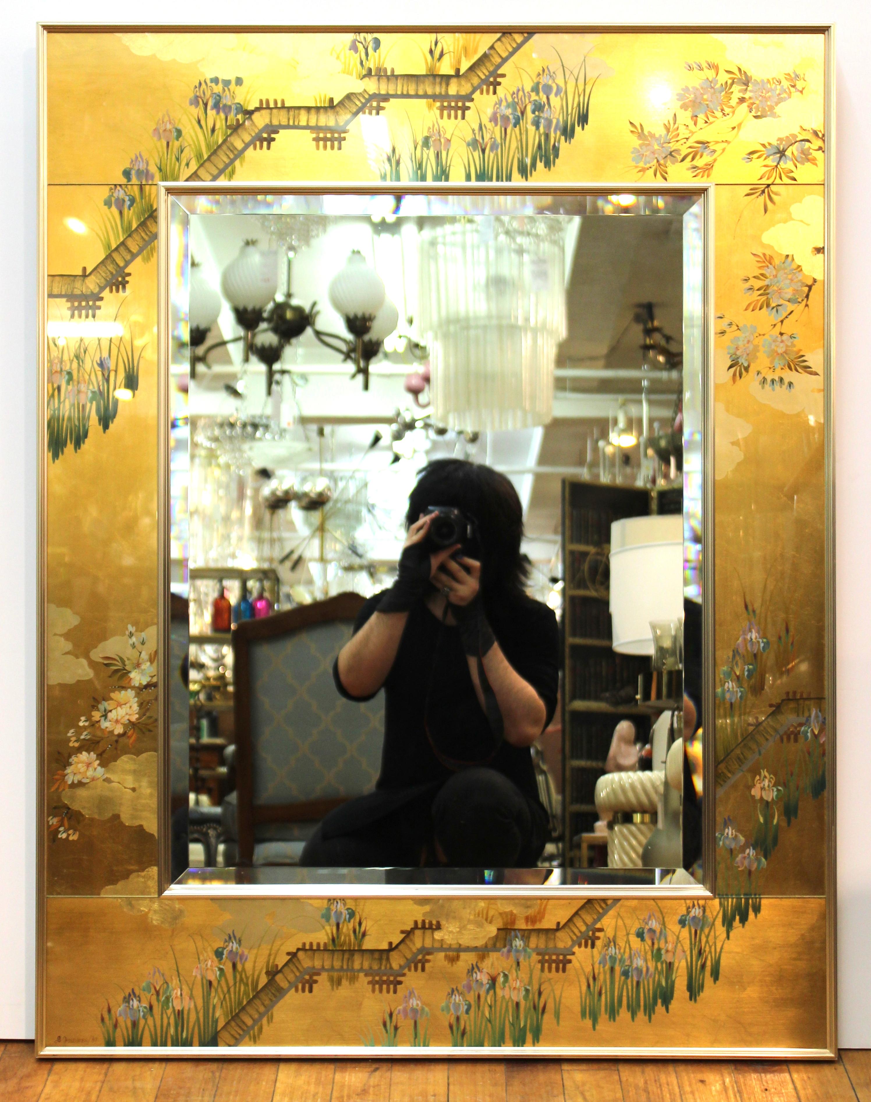 LaBarge Hollywood Regency hand painted eglomise wall mirror with chinoiserie theme, signed 'S. Goldstein 89' in lower left corner. In great vintage condition with age-appropriate wear and use.