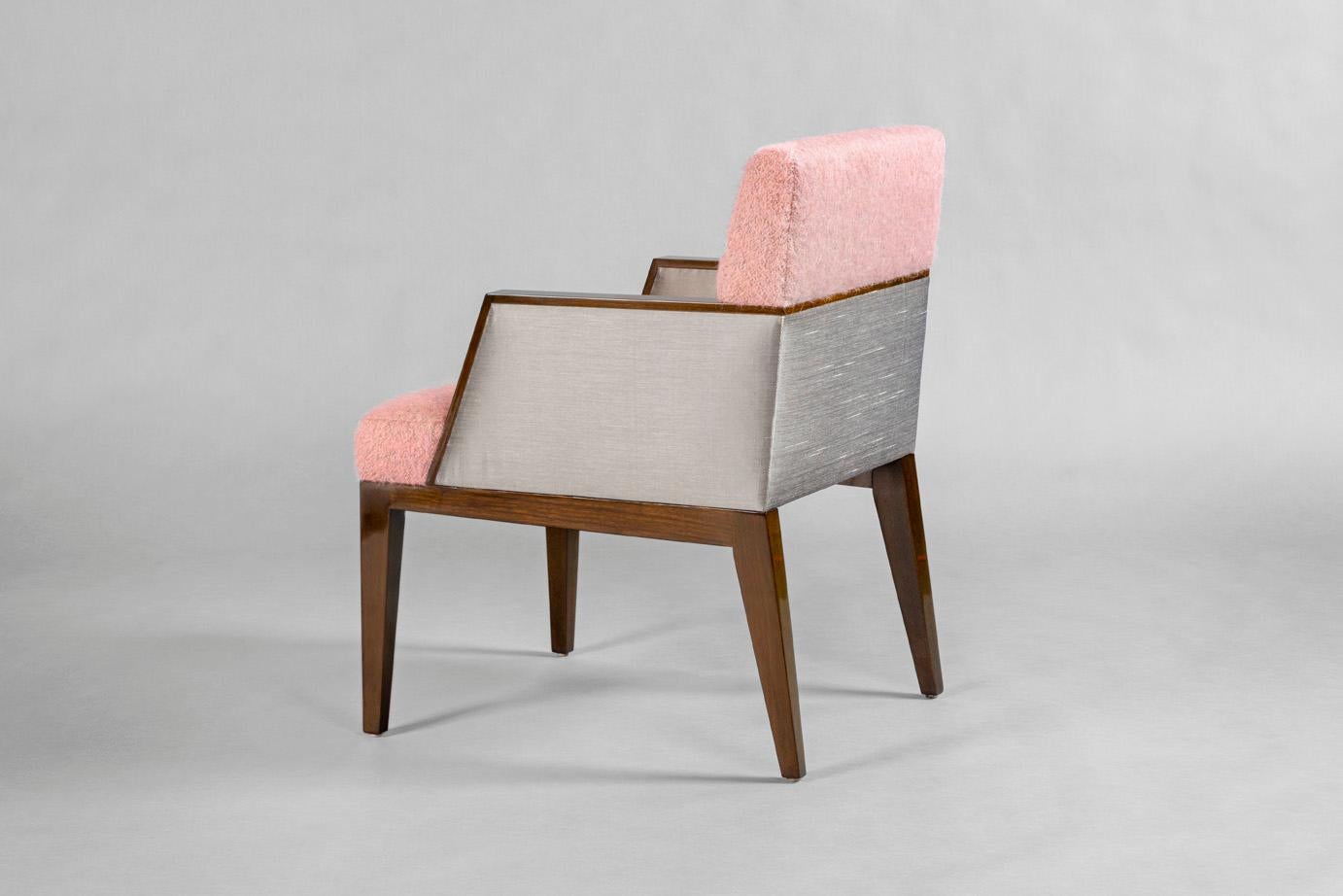 High gloss finished walnut armchair with the back and seat upholstered in pink mohair, the sides in gray silk. 
Custom sizes, finishes, materials available.
  