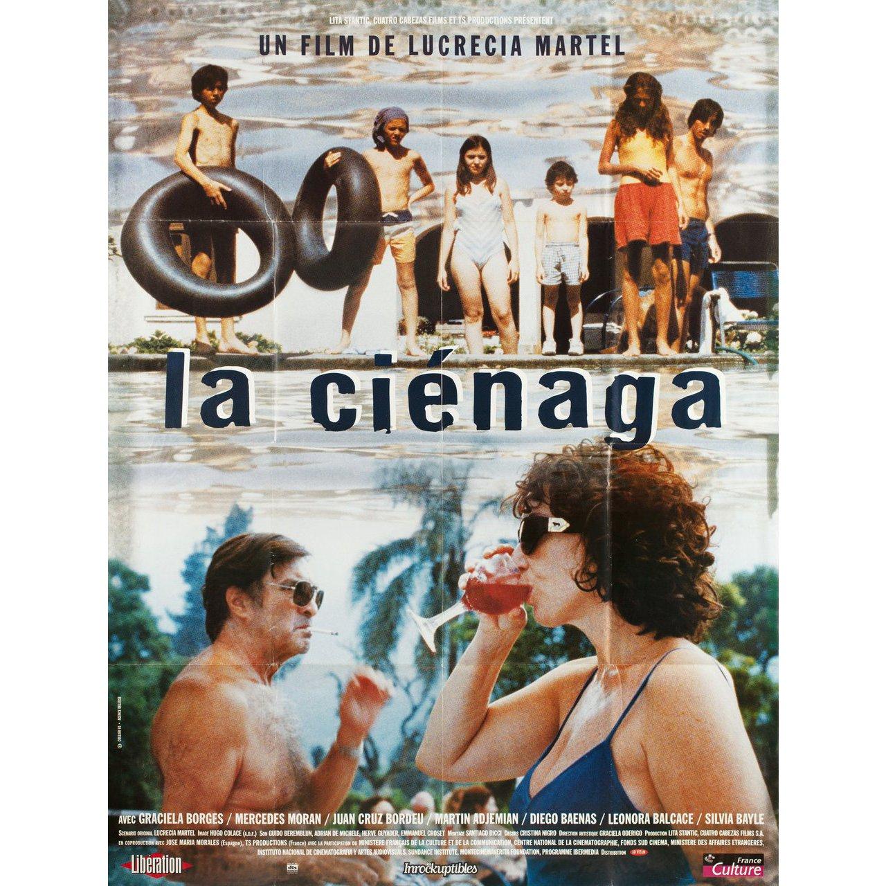 Grande affiche originale française de 2001 pour le film La Cienaga réalisé par Lucrecia Martel avec Mercedes Moran / Graciela Borges / Martin Adjemian / Leonora Balcarce. Très bon état, plié. De nombreuses affiches originales ont été publiées pliées