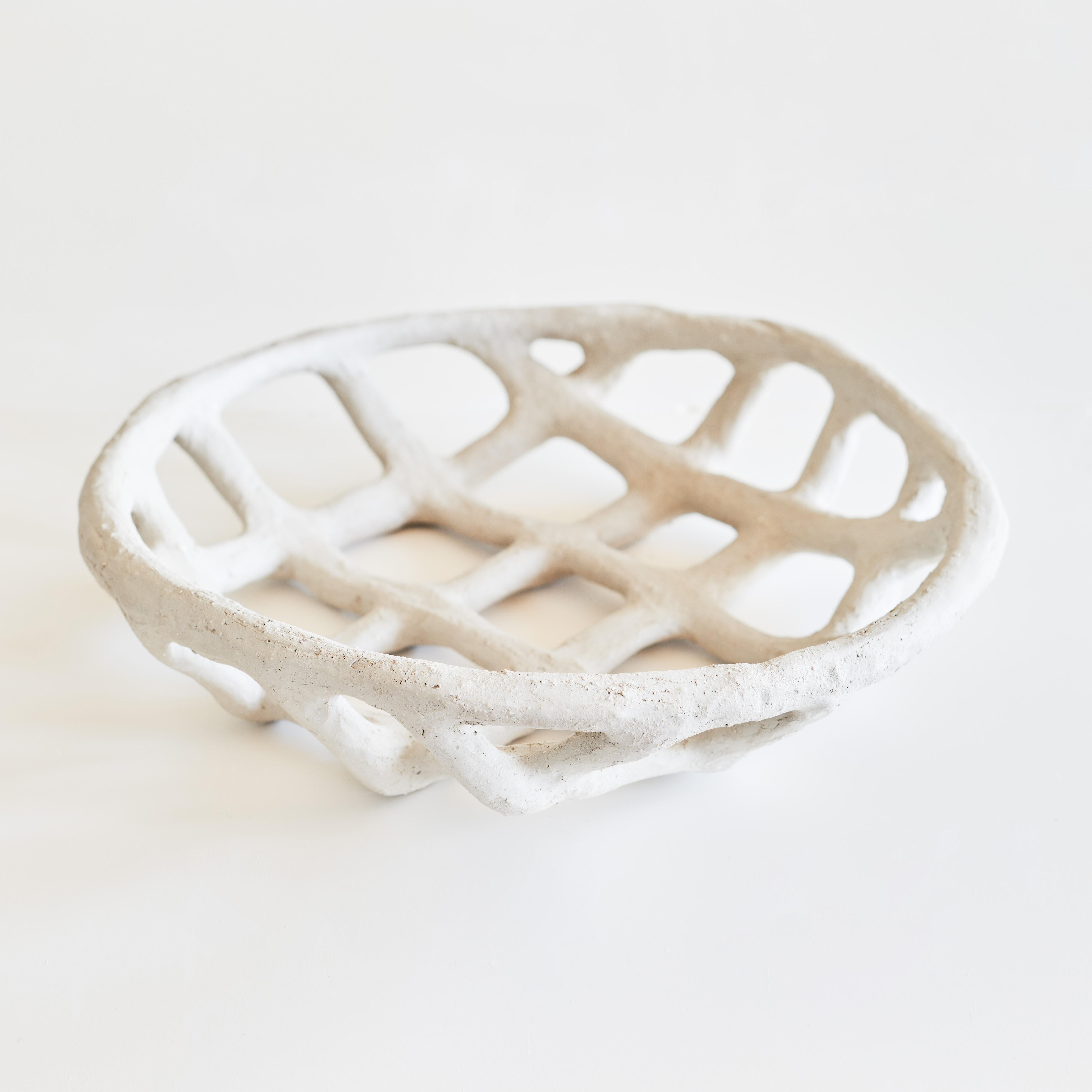 La Corbeille IV by Claire Pain 
Dimensions: D 40 x H 8 cm
Materials: Stoneware

Fragility and delicacy arise from a raw material, in which strength and vigour intertwine to give shape to the singular work of Claire Pain.
Modeled through the