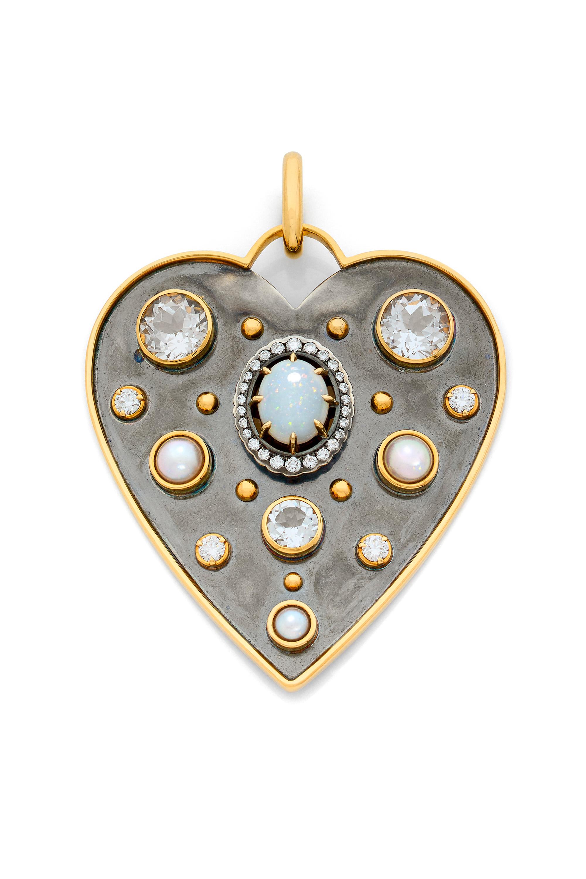 Yellow gold and distressed silver charm studded with an opal surrounded by diamonds, white sapphires and akoya pearls. Openable gold bail.

Sold without the chain. 

Available with chain on request.

Details:
Opal, White Sapphire and Akoya Pearls
32