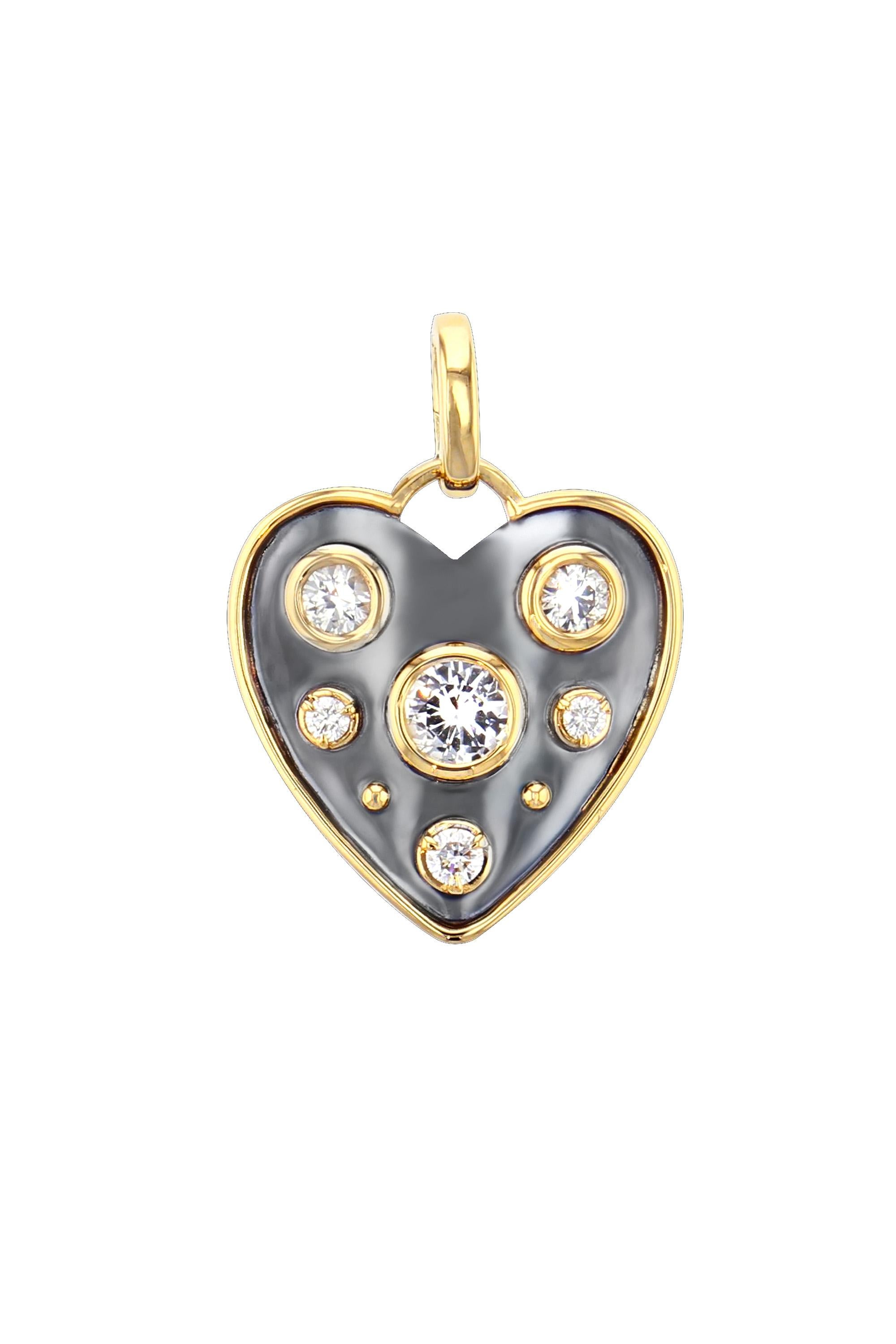 Yellow gold and distressed silver charm studded with a white sapphire in the center and surrounded by diamonds. Openable gold bail.

Sold without the chain. 

Available with chain on request.

Details:
White Sapphire: 0.75 cts
3 Diamonds: 0.12