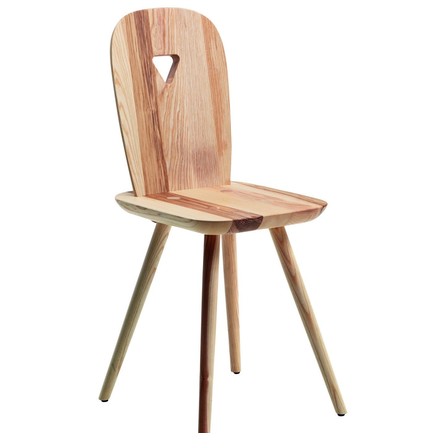 Designed by Luca Nichetto, the La-Dina chair uses an ingenious assembly system that gives stability to the chair while removing unnecessary elements that distract from the elegant design. This set includes two chairs of natural ashwood with four